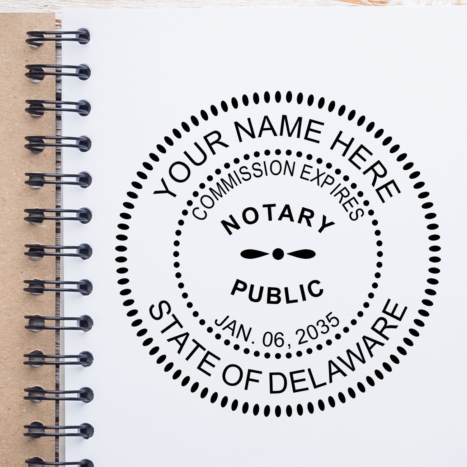 Image of a notarial stamp design on a notebook. Blog post name: Notarial Stamp: What You Need to Know Feature Post Image.