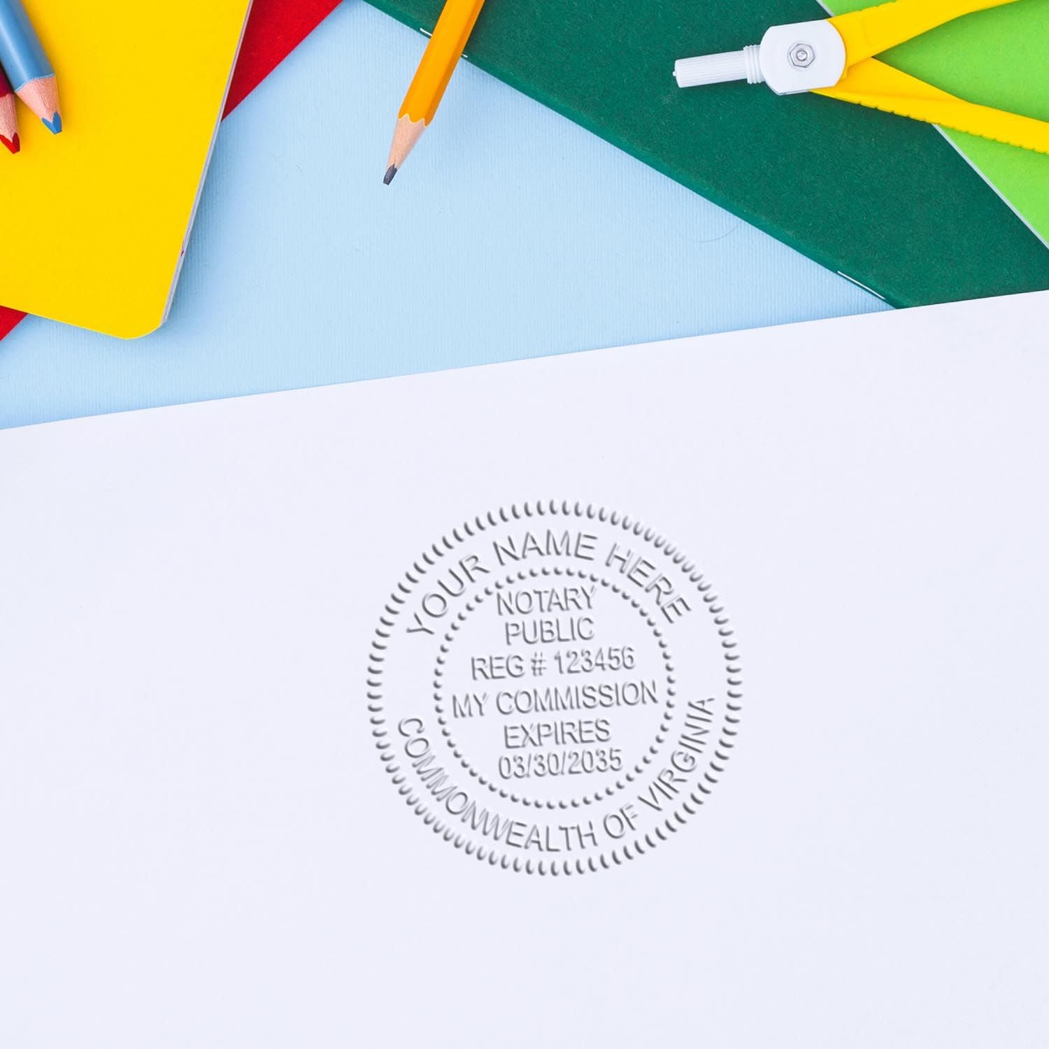 Notarial Seals Blog Post Feature Image: Close-up of a Virginia notary public embossing seal on white paper, surrounded by colorful stationery.