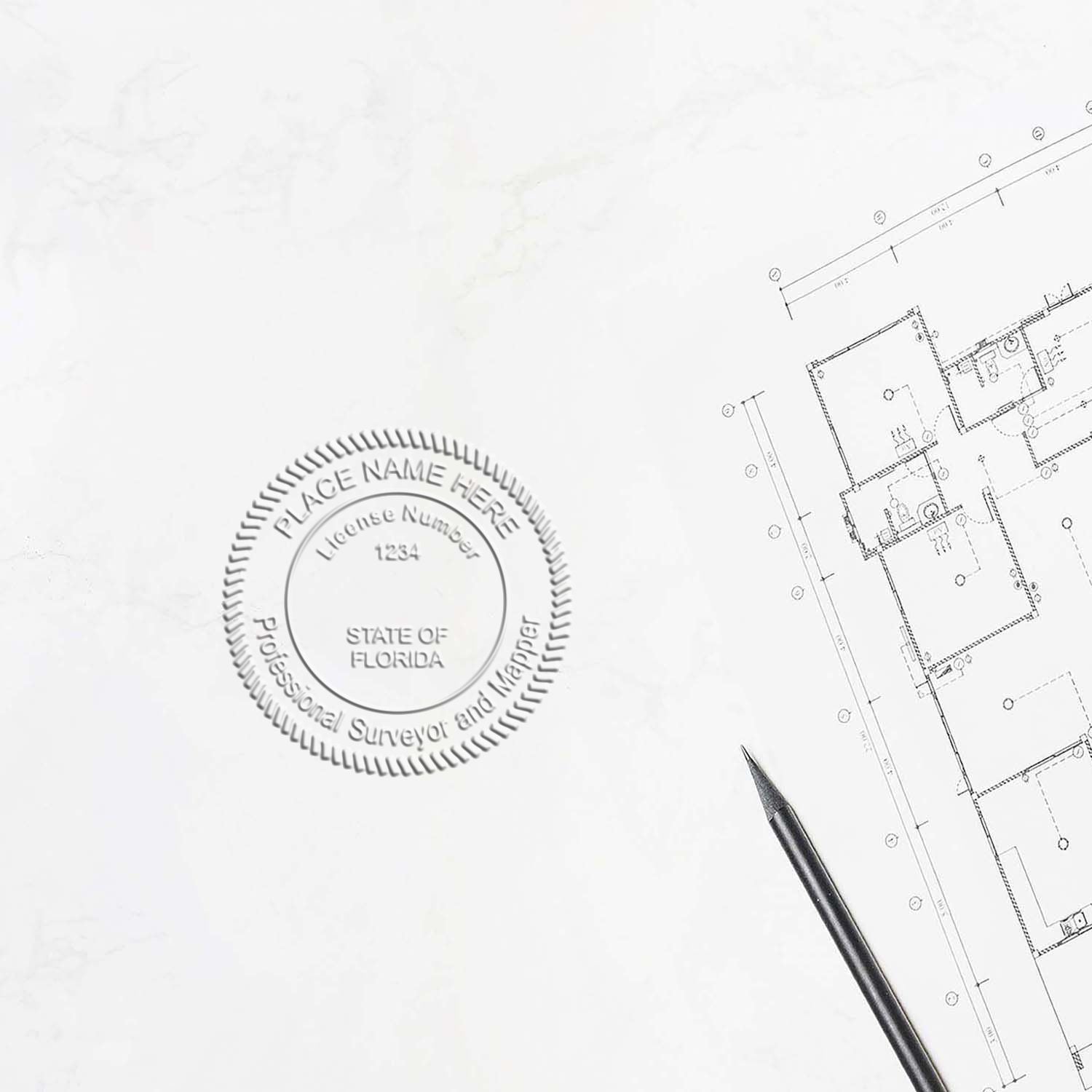 Florida Land Surveyor Seal embossed on a document next to a building floor plan and a pencil. Blog post: Florida Land Surveyor Seal.