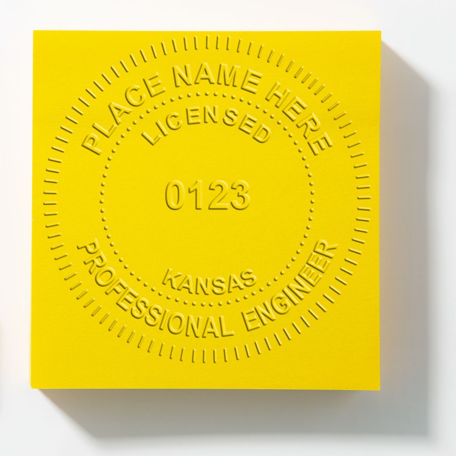 Image of a Kansas Professional Engineer Seal with placeholder text for name and license number. Blog post: Kansas Professional Engineer Seal.