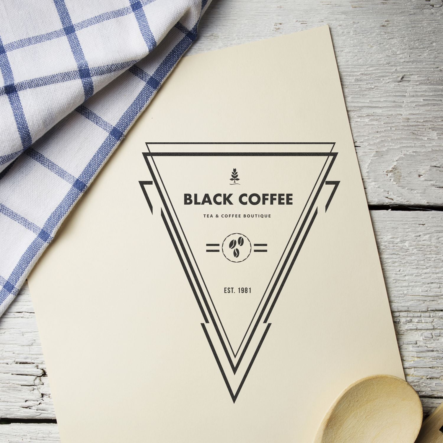 Create Custom Business Stamps Easily and Quickly Feature Post Image: A custom rubber stamp imprint on paper with a coffee shop logo.