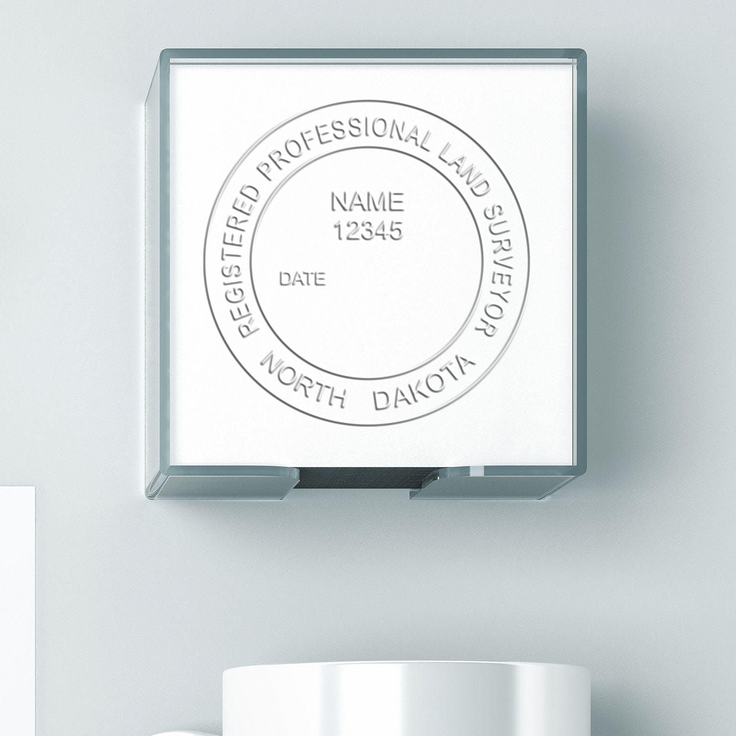 Image of a North Dakota Land Surveyor Seal with a blank space for name, date, and registration number. Blog post: North Dakota Land Surveyor Seal.