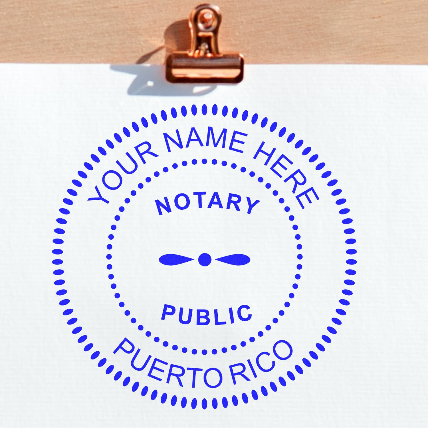 Making Your Mark: Notary Seal Design Strategies for Success Feature Image. A notary seal with 'Your Name Here' and 'Puerto Rico' on a clipped paper.