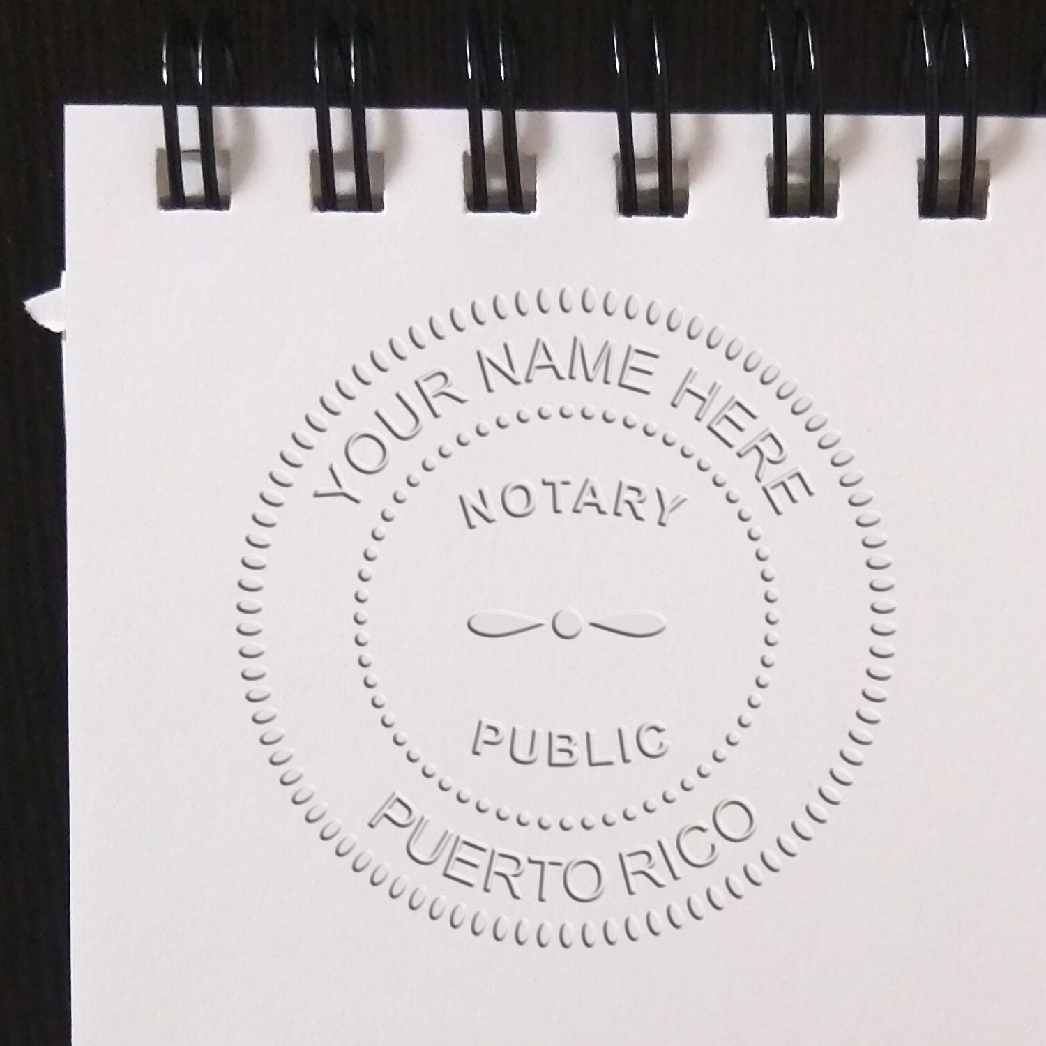 Stamps with Commission Numbers Exposed Feature Image: A notary public stamp impression on white paper, labeled 'Puerto Rico'.