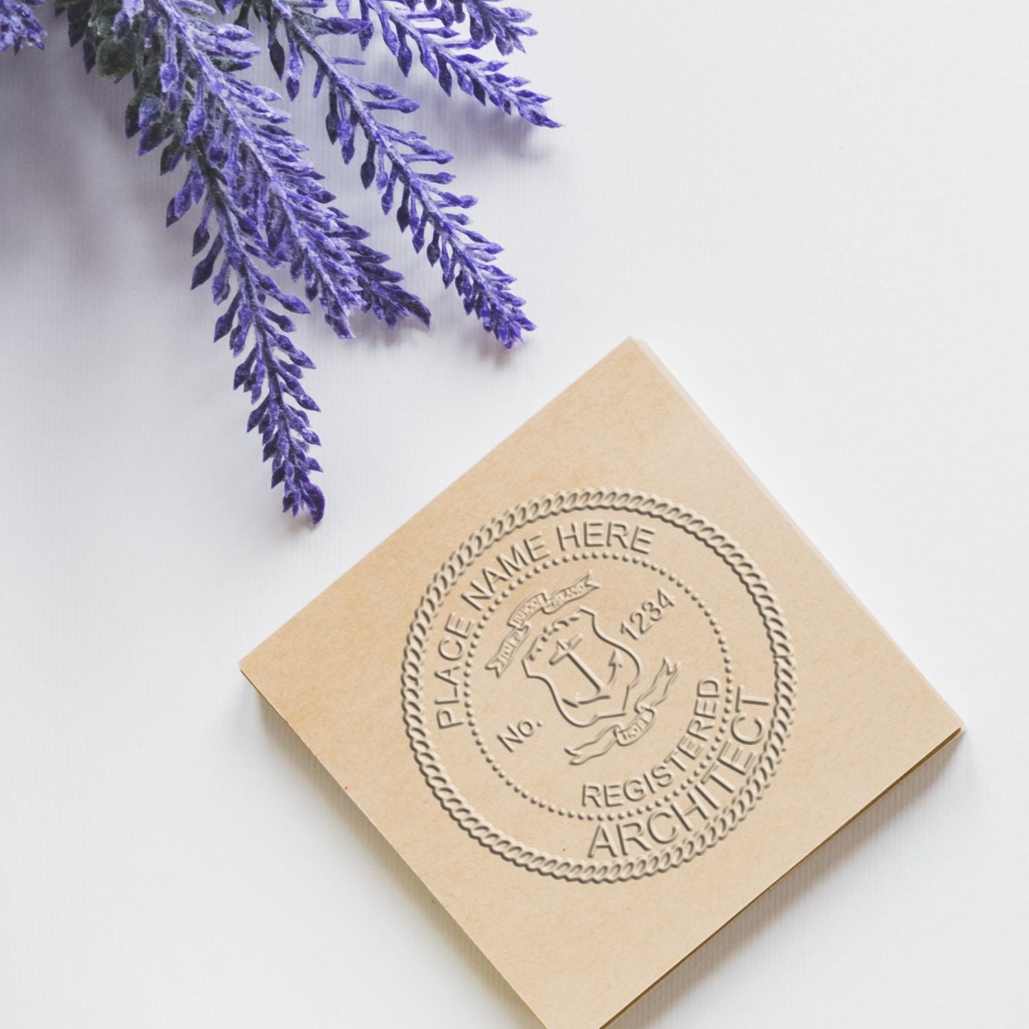 Rhode Island Architectural Seal Stamp embossed on paper with lavender sprigs. Blog post: Rhode Island Architectural Seal Stamp.