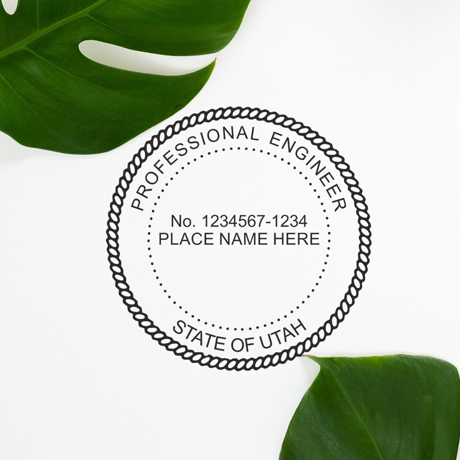 Utah Professional Engineer Stamp Rules and Regulations Feature Post Image: A Utah professional engineer stamp on a white background with green leaves.