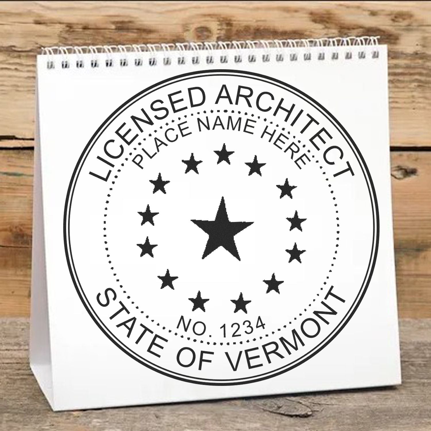 Leave Your Mark: Choosing the Perfect Vermont Architect Seal Feature Image. A spiral-bound notebook with a Vermont architect seal design.