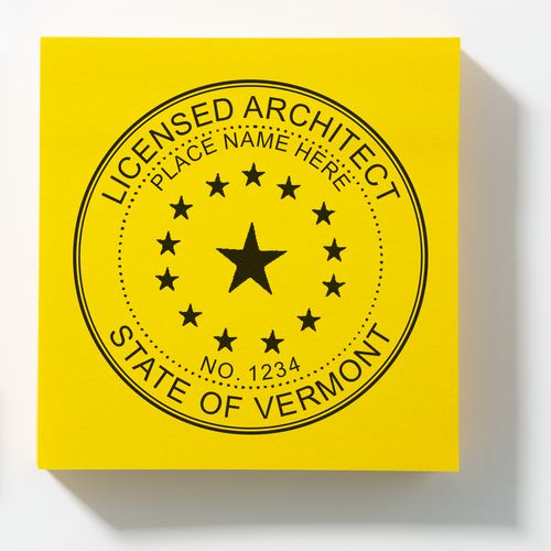 Image of Vermont’s Architect Seal on a yellow background, featuring a central star, surrounding stars, and text for licensed architects in Vermont.