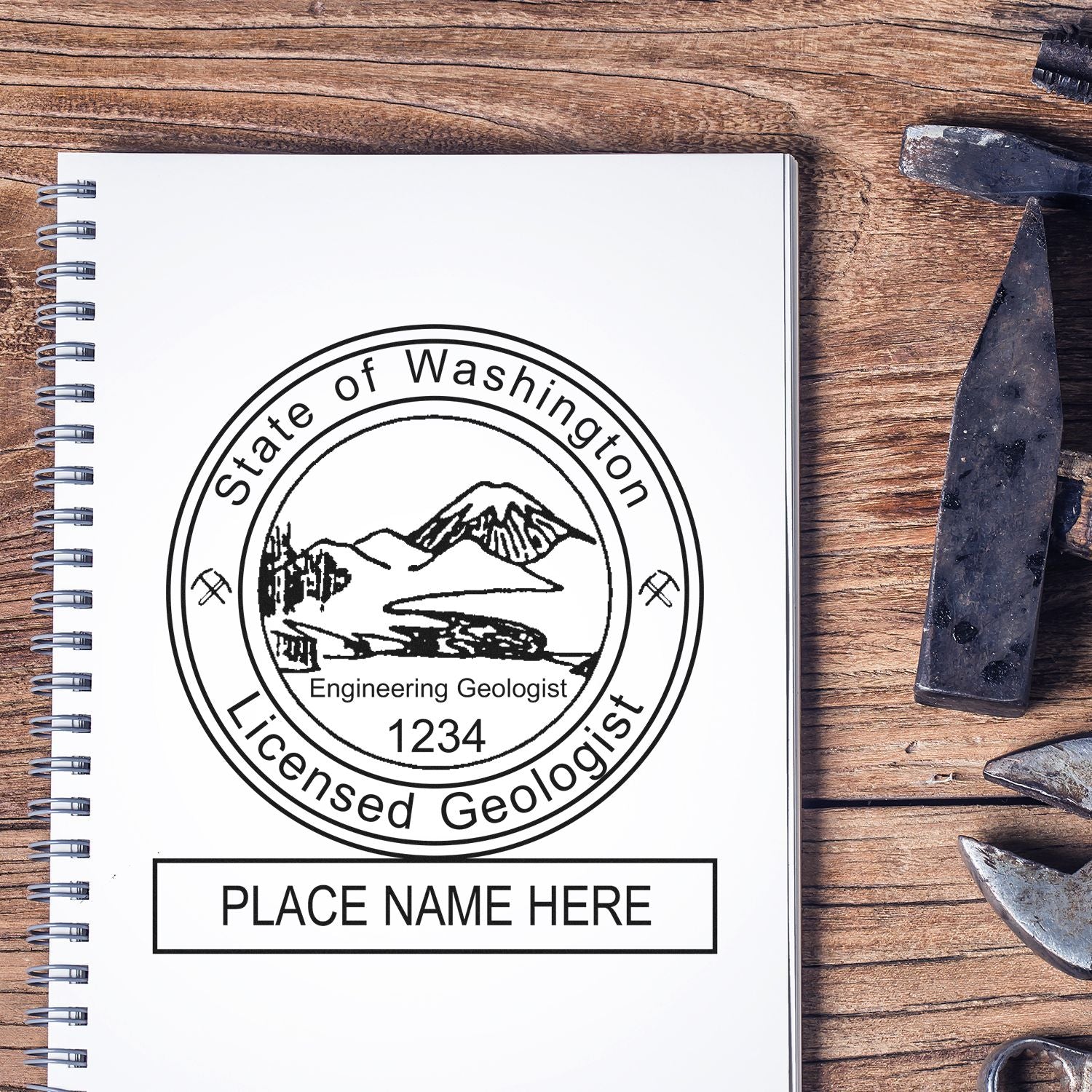 Sealing Success: Your Path to a Professional Geologist Stamp Feature Image. Notebook with Washington Licensed Geologist stamp on wooden desk.