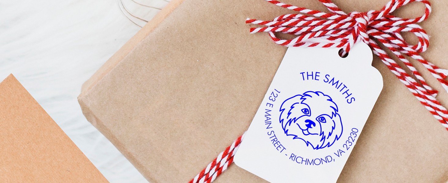 Wrapped gift with a twine bow & a tag labeled "The Smiths" with a Shih Tzu dog face & address stamped with Shih Tzu Dog Stamp