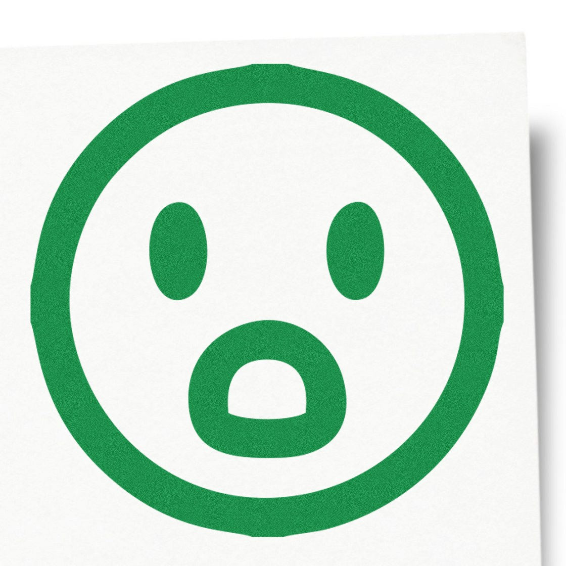 Self-Inking Surprised Sam Emotes Stamp featuring a green surprised face design on a white background, perfect for adding expressive flair to documents and crafts.