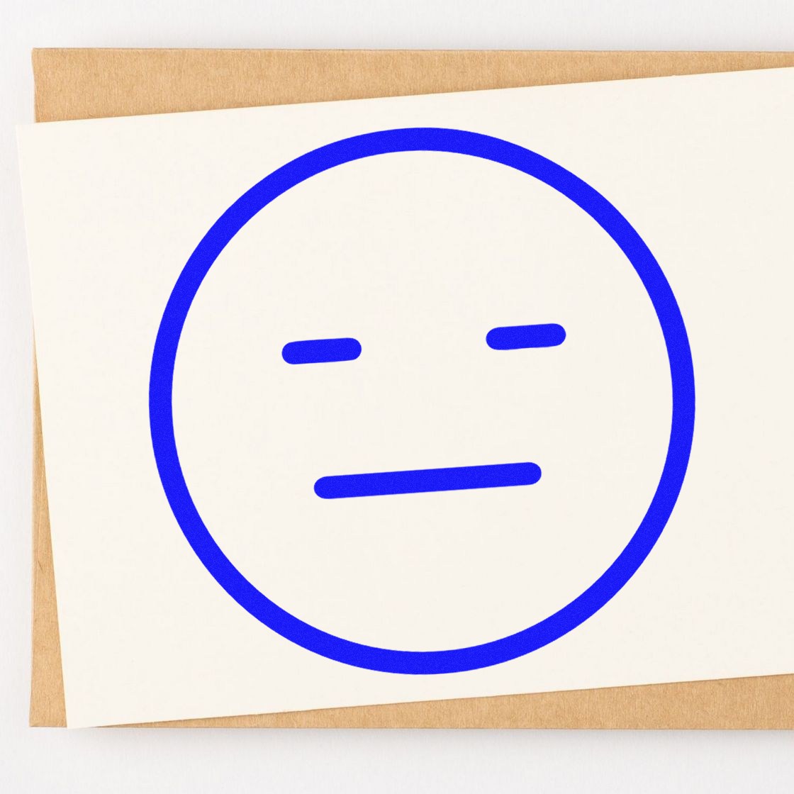 Self-Inking Meh Marvin Emoji Stamp featuring a blue, expressionless face on white paper, perfect for adding a touch of humor to your stationery.