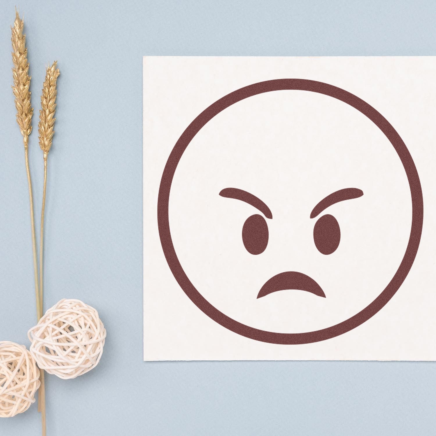 Self-Inking Furious Fred Emoji Stamp on light blue background, featuring a bold, angry face design. Perfect for adding expressive flair to your projects.