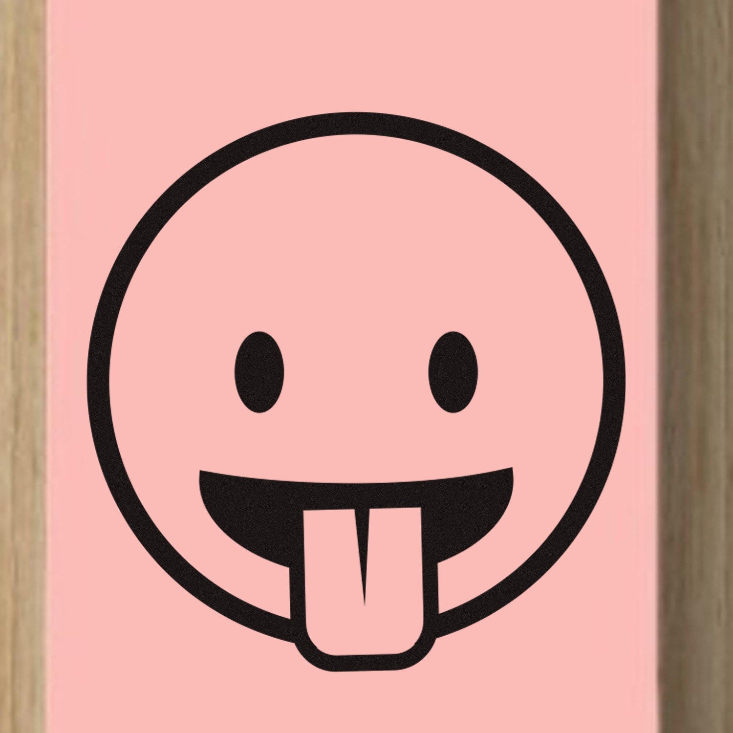 Self-Inking Goofy Grin Emoji Stamp with a playful tongue-out design on a pink background, perfect for adding fun to your crafts and stationery.