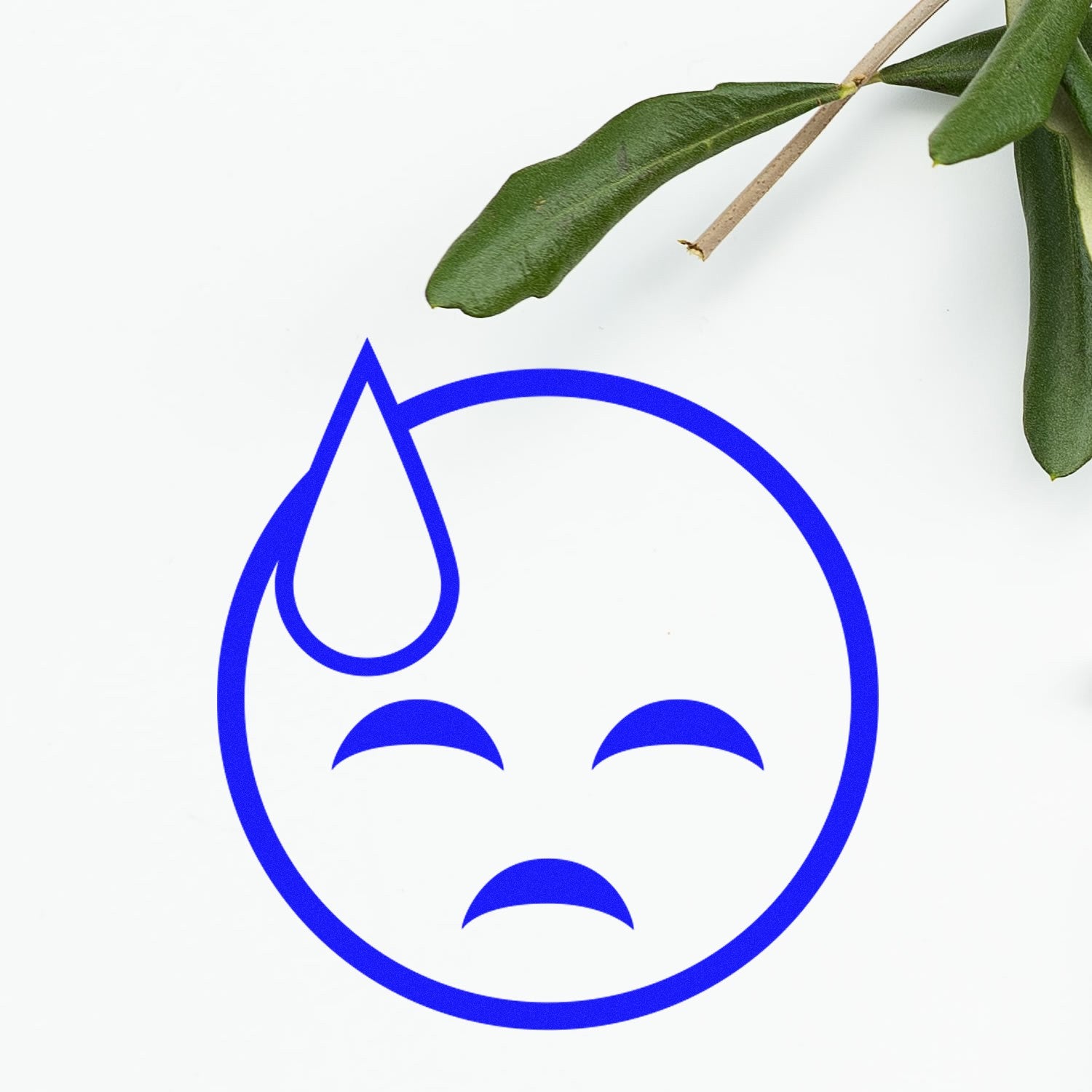 Self-Inking Sweaty Sadface Emoji Stamp featuring a blue sad face with a sweat drop, perfect for adding expressive details to your projects.