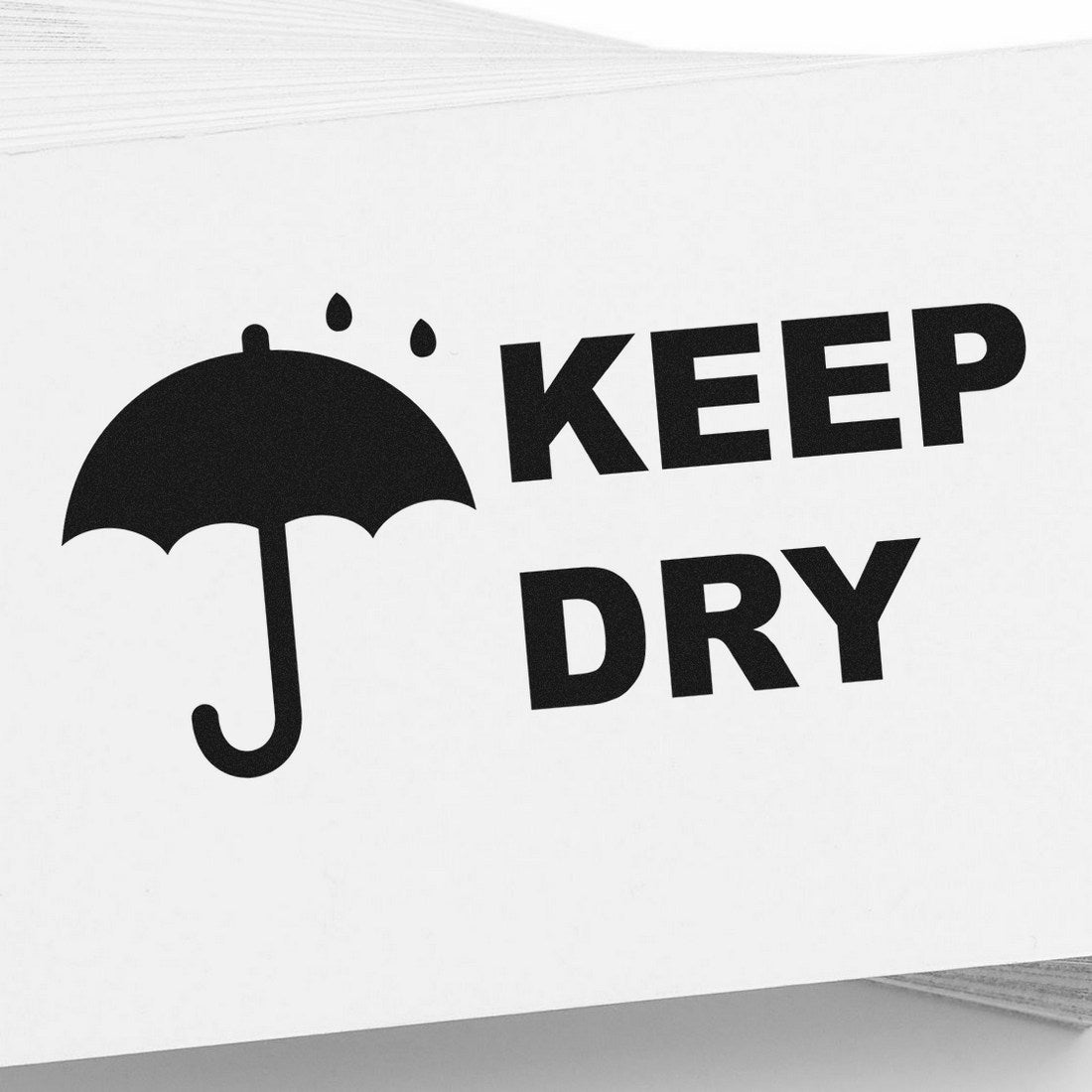 Self-Inking Keep Dry with Umbrella Stamp featuring a black umbrella icon with raindrops and bold 'Keep Dry' text, ideal for packaging and shipping needs.