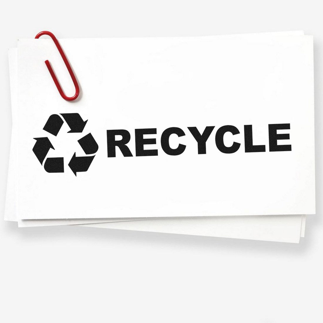 Wood Handle Recycle Symbol Rubber Stamp imprint on white paper with a red paperclip, showcasing the recycle symbol and the word 'RECYCLE' in bold black letters.