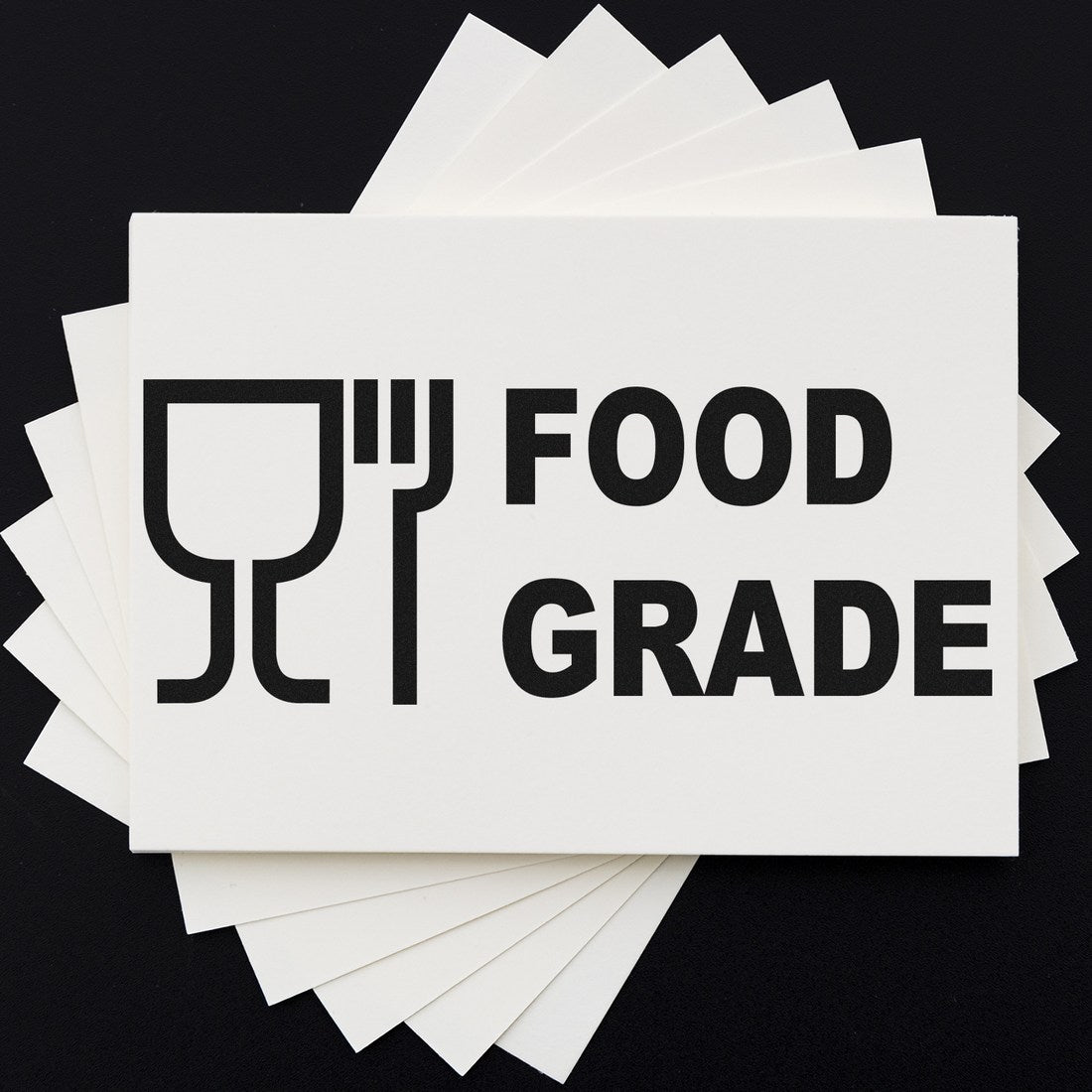 Slim Pre-Inked Certified Food Grade Stamp on black background, featuring bold Food Grade text and utensil icon, ideal for marking food-safe products.