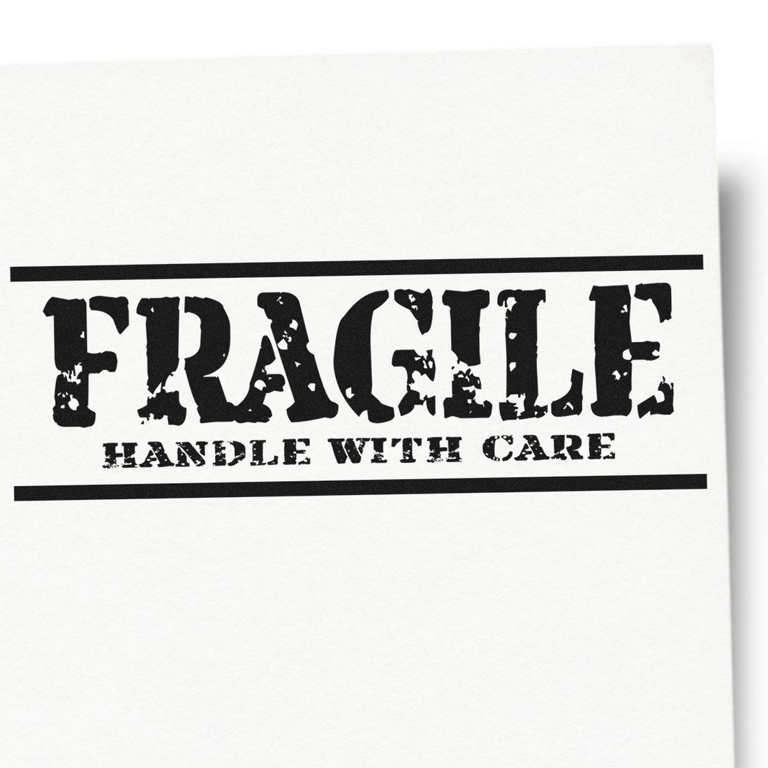 Self-Inking Rustic Fragile Handle With Care Stamp on white paper, featuring bold, distressed lettering for clear package labeling. Ideal for shipping and handling instructions.