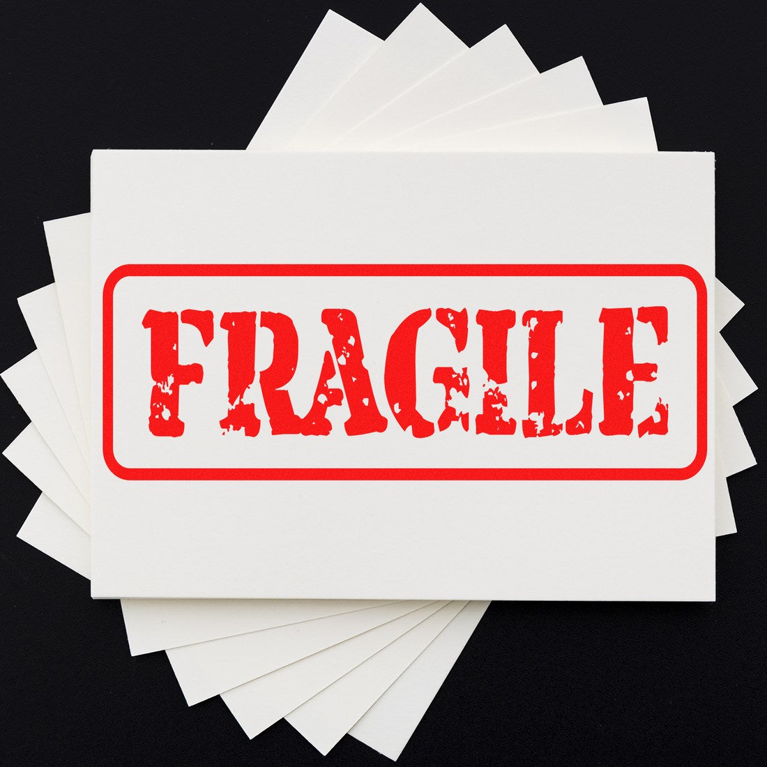 Maxlight Premium Fragile Packing Stamp with bold red FRAGILE text on a white background, ideal for marking packages.