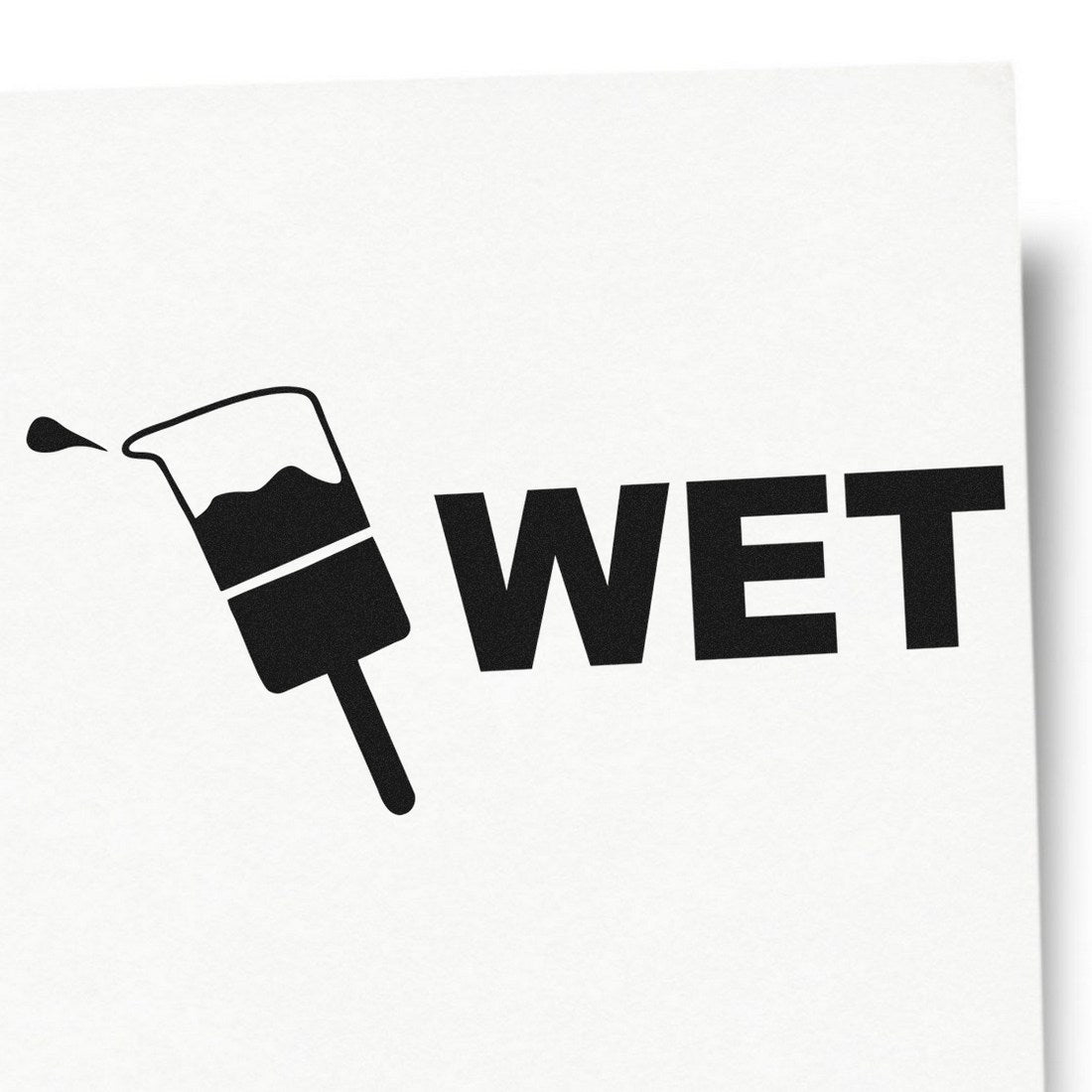 Maxlight Premium Wet Stamp with bold 'WET' design and splash graphic on a white background, showcasing its high-quality imprint.