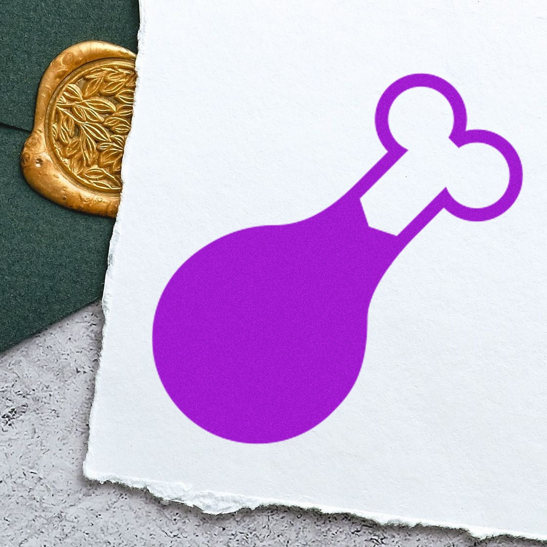 Self-Inking Foodie Delight Loyalty Card Stamp with a purple drumstick design on white paper, featuring a gold wax seal and green envelope in the background.