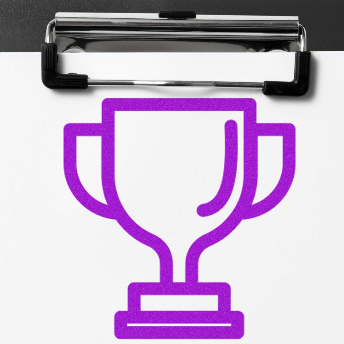 Wood Handle Winning Customer Reward Rubber Stamp with a purple trophy design on a clipboard, showcasing its use for rewarding achievements.