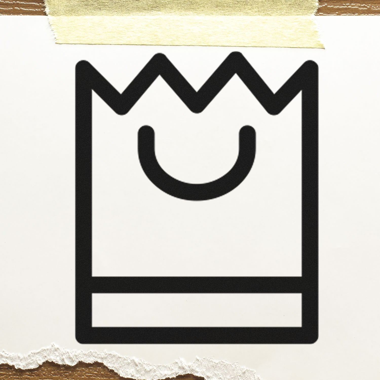 Self-Inking Shopper's Delight Reward Program Stamp with a smiling shopping bag icon, taped to a surface. Ideal for loyalty programs and customer rewards.