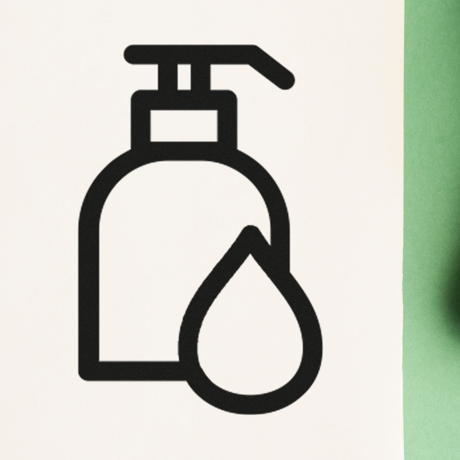 Self-Inking Pampered Loyalty Incentive Stamp with a sleek black design, featuring a lotion bottle icon and a green background, ideal for customer rewards and branding.