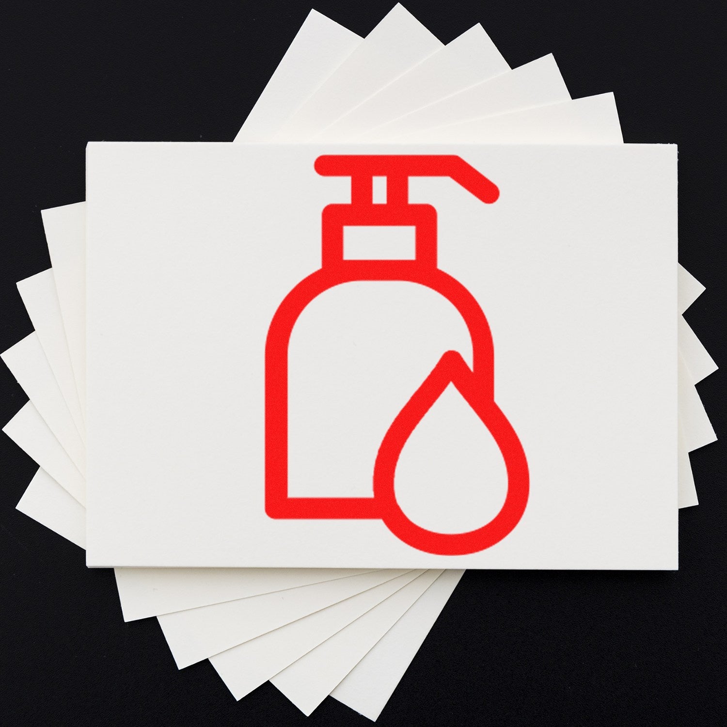 Self-Inking Pampered Loyalty Incentive Stamp with a red ink design, featuring a pump bottle icon on a stack of white cards, ideal for customer rewards and branding.