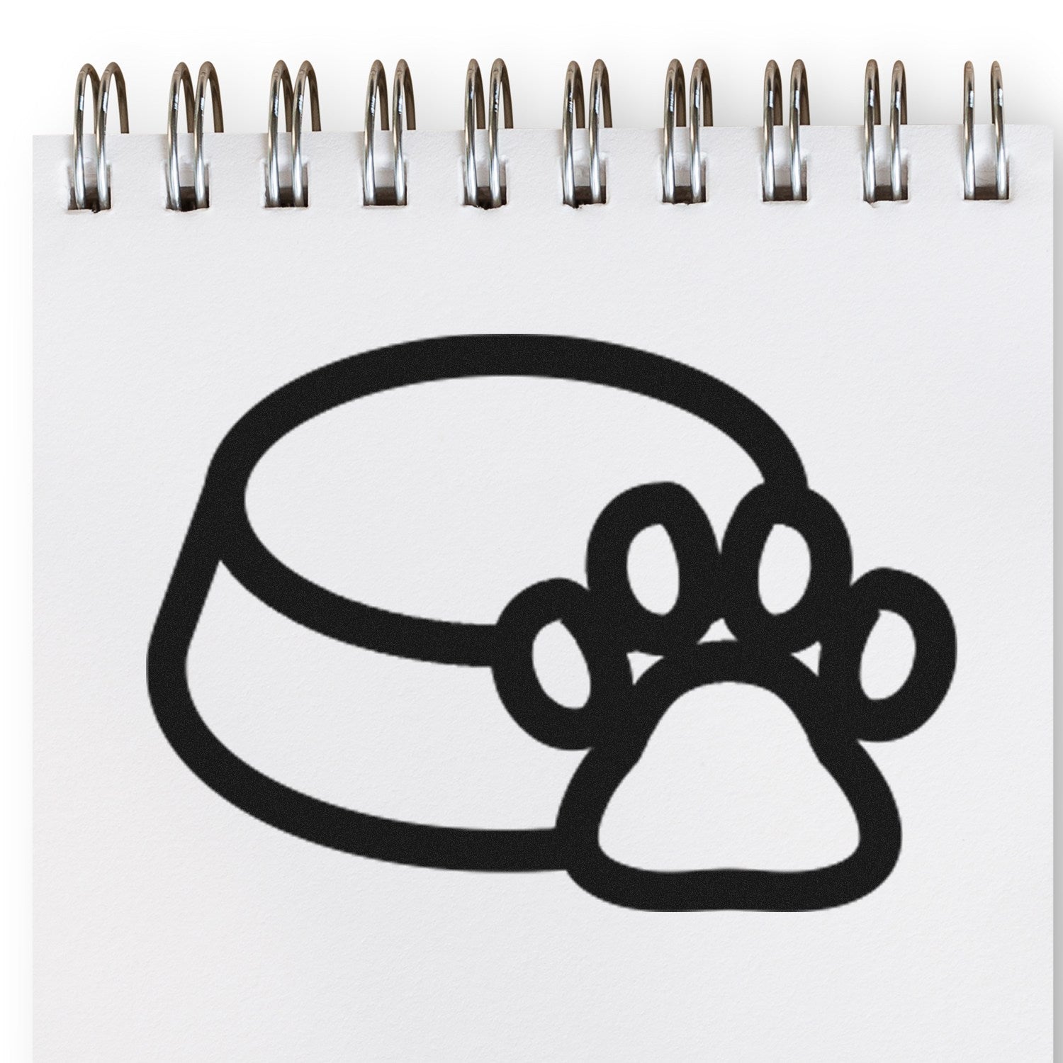 Self-Inking Doggy Loyalty Card Stamp featuring a paw print and bowl design on a spiral-bound notepad. Perfect for pet-themed businesses and loyalty programs.