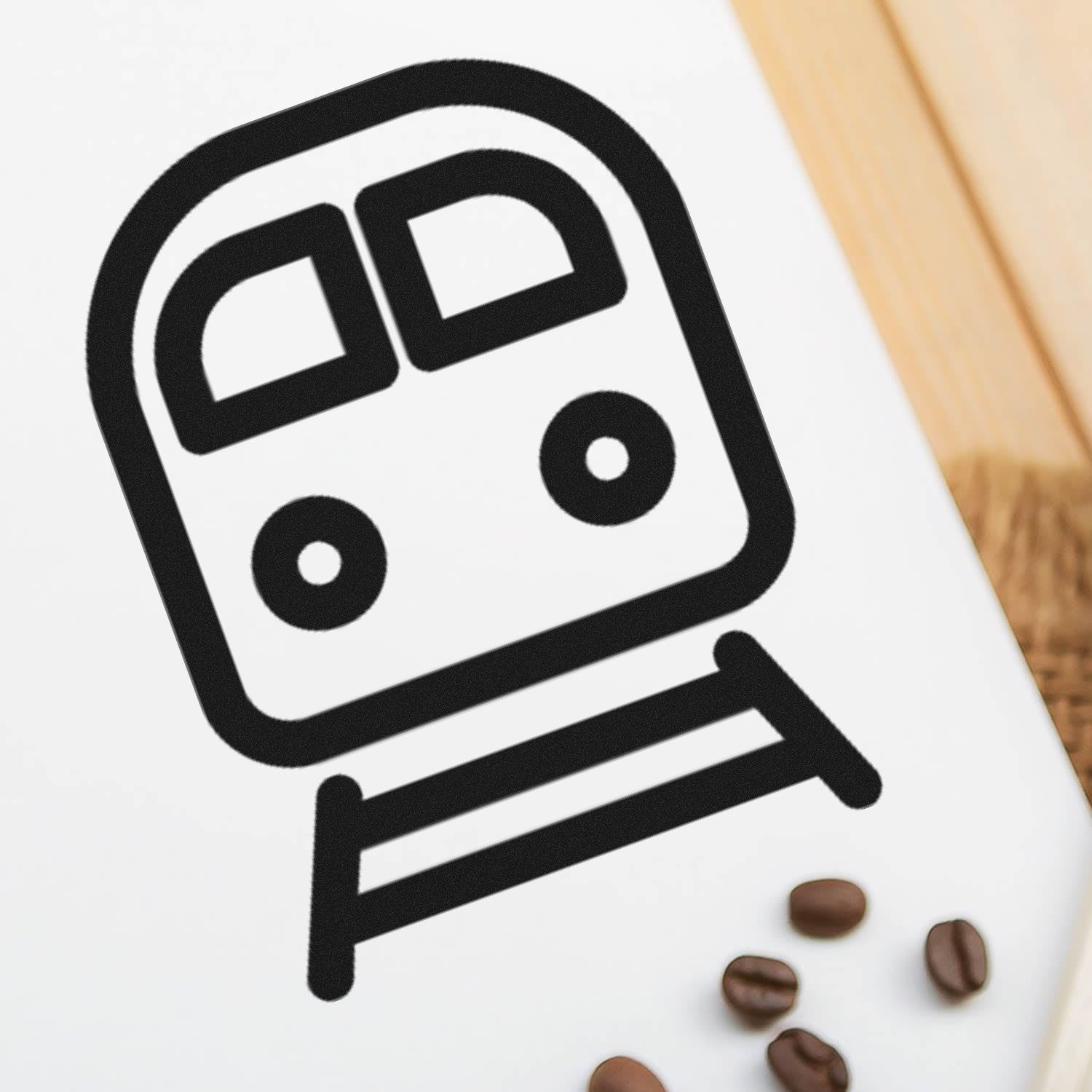 Wood Handle Happy Railways Loyalty Scheme Rubber Stamp featuring a train design, displayed on a white surface with coffee beans nearby. Perfect for crafting and loyalty programs.