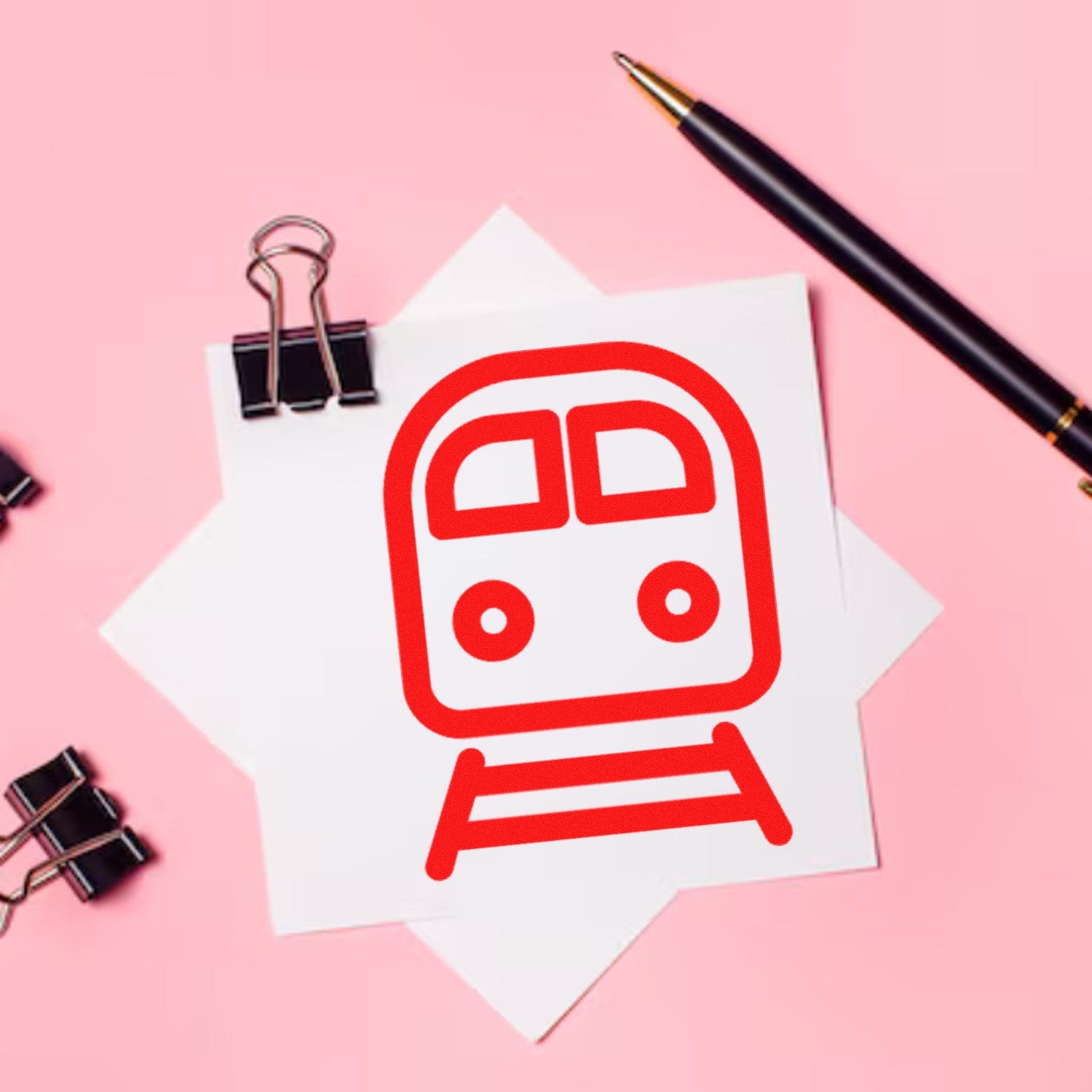 Self-Inking Happy Railways Loyalty Scheme Stamp on pink background, featuring a red train icon. Includes a black pen and paper clips, perfect for loyalty programs and branding.