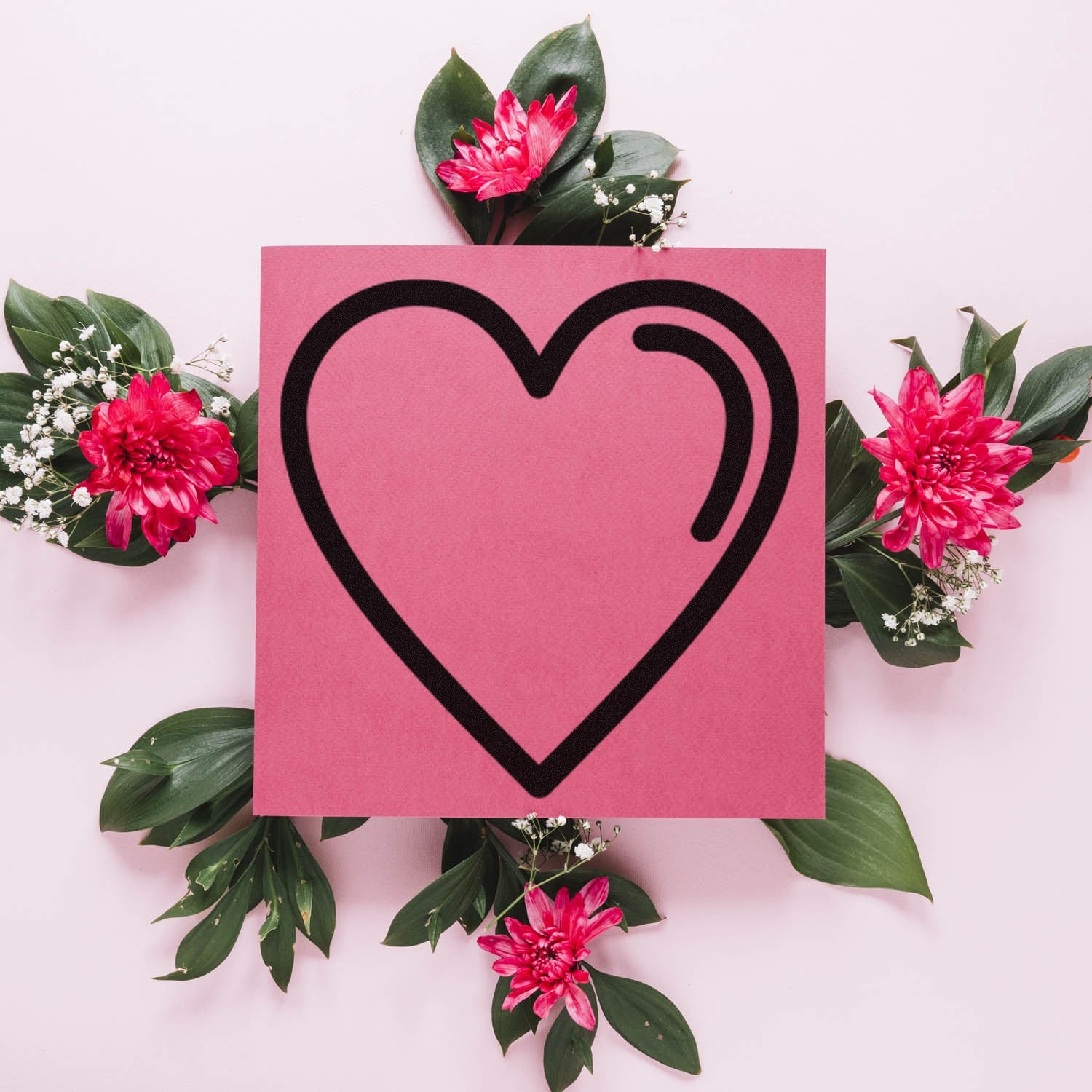 Self-Inking Heartfelt Loyalty Stamp featuring a bold black heart design on a pink background, surrounded by vibrant red flowers and green leaves. Perfect for adding a personal touch.