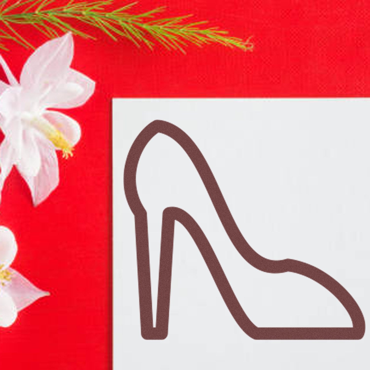 Self-Inking Shoe Loyalty Card Stamp with high heel shoe design on a red background, adorned with white flowers. Perfect for retail loyalty programs.