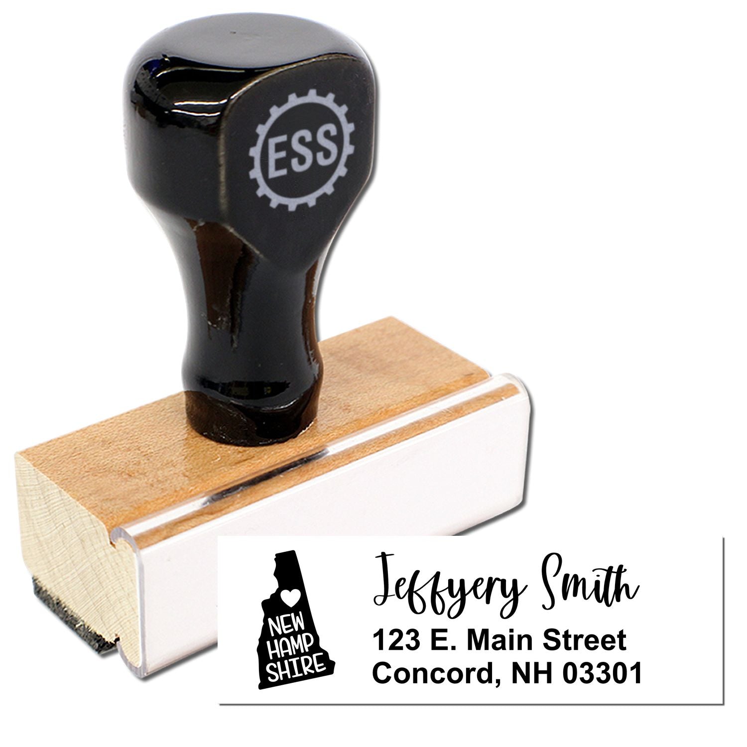 Image of the New Hampshire State Love Personalized Address Stamp with a wooden base and black handle, featuring a sample address: Jeffery Smith, 123 E. Main Street, Concord, NH 03301.