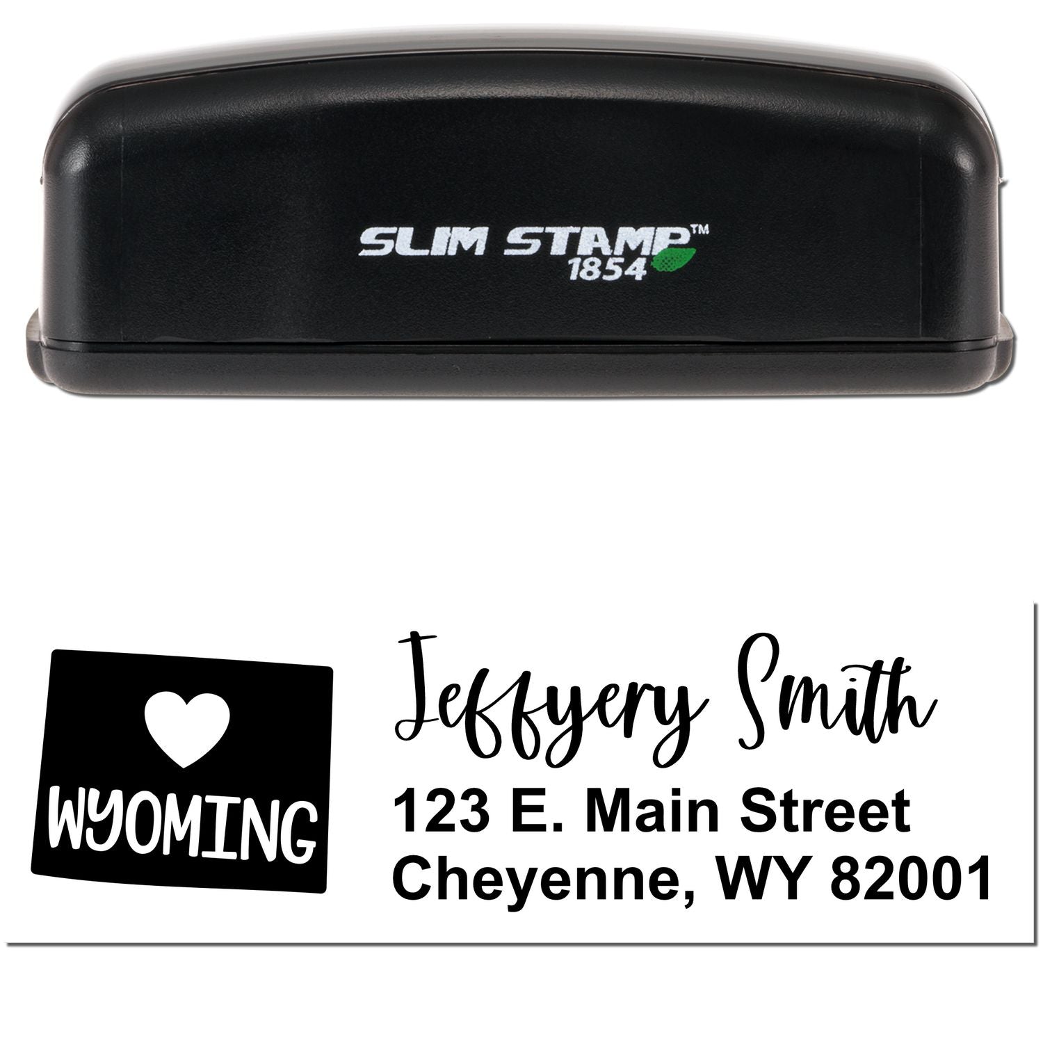 Image of a Slim Wyoming Custom Address Stamp for Envelopes, featuring a black casing and a sample imprint with a heart icon, Wyoming, and an address: 123 E. Main Street, Cheyenne, WY 82001.