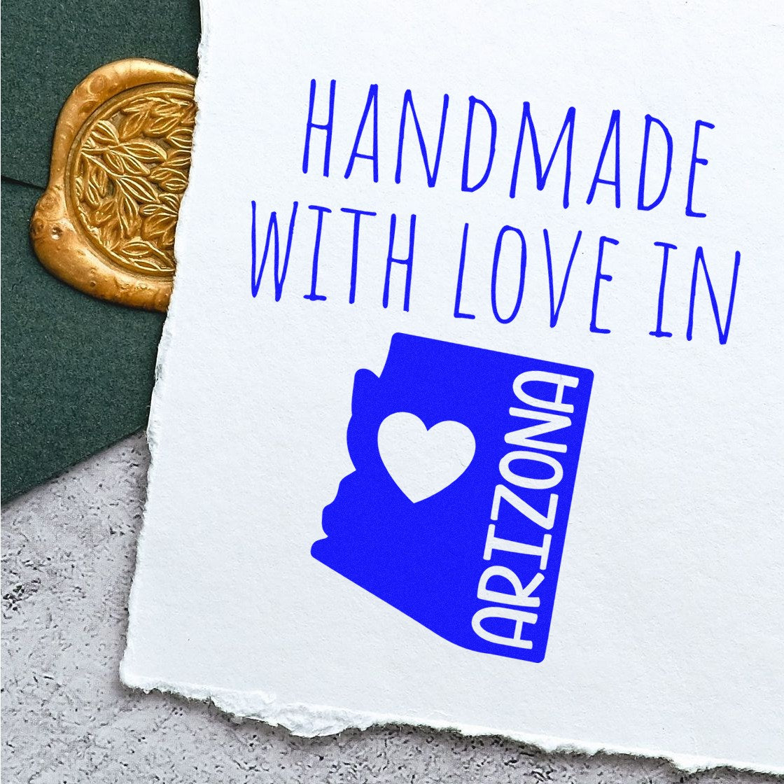 Self-Inking Arizona Handmade with Love Stamp featuring a blue design of Arizona with a heart, perfect for crafts and gifts.