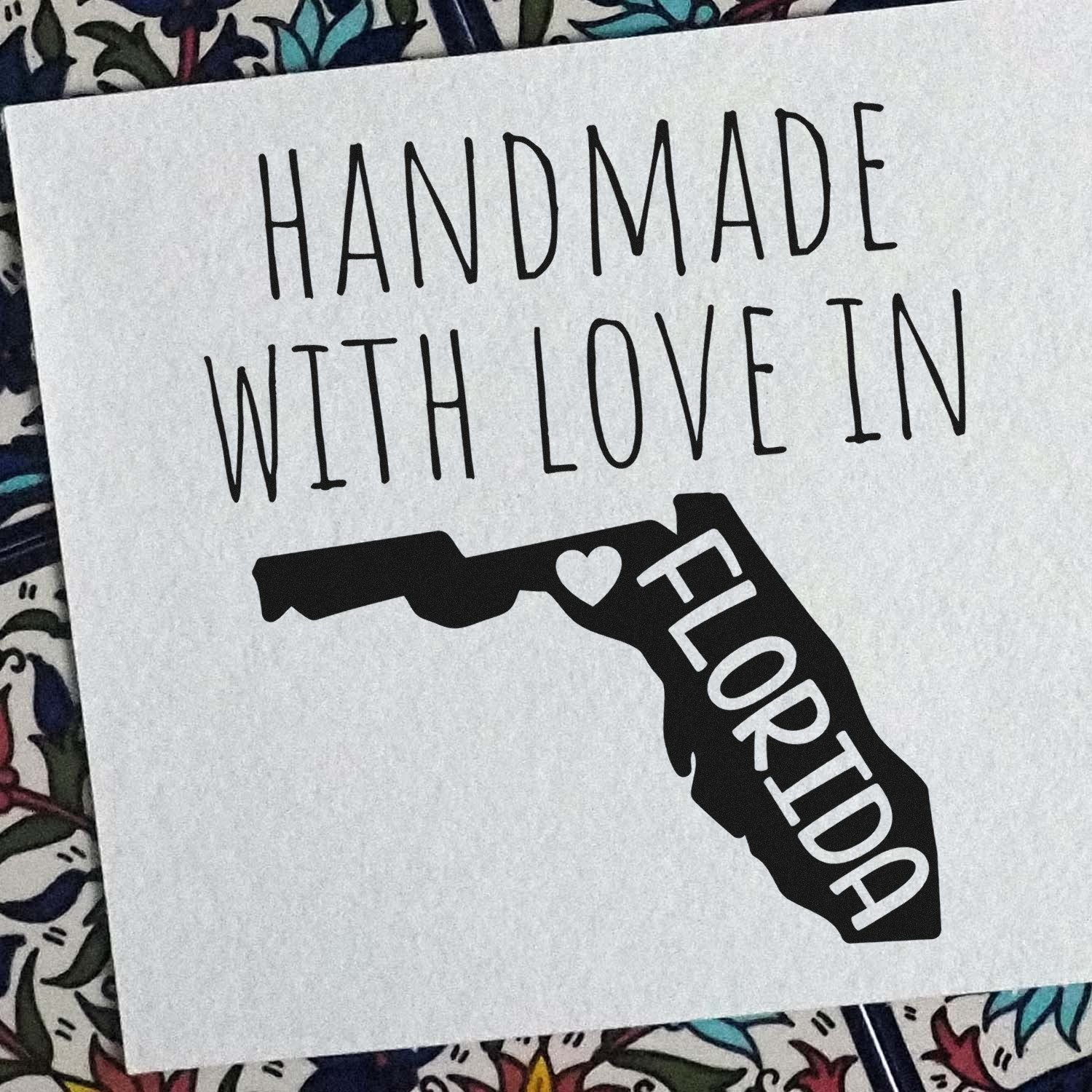 Self-Inking Florida Handmade with Love Stamp on paper, featuring a heart and Florida state outline. Perfect for crafts and gifts.