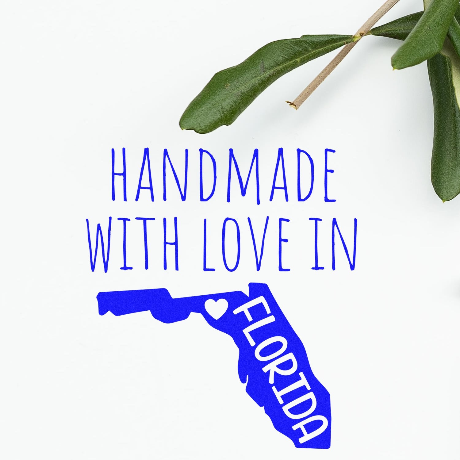 Self-Inking Florida Handmade with Love Stamp featuring a blue Florida state outline with a heart, perfect for crafts and gifts.