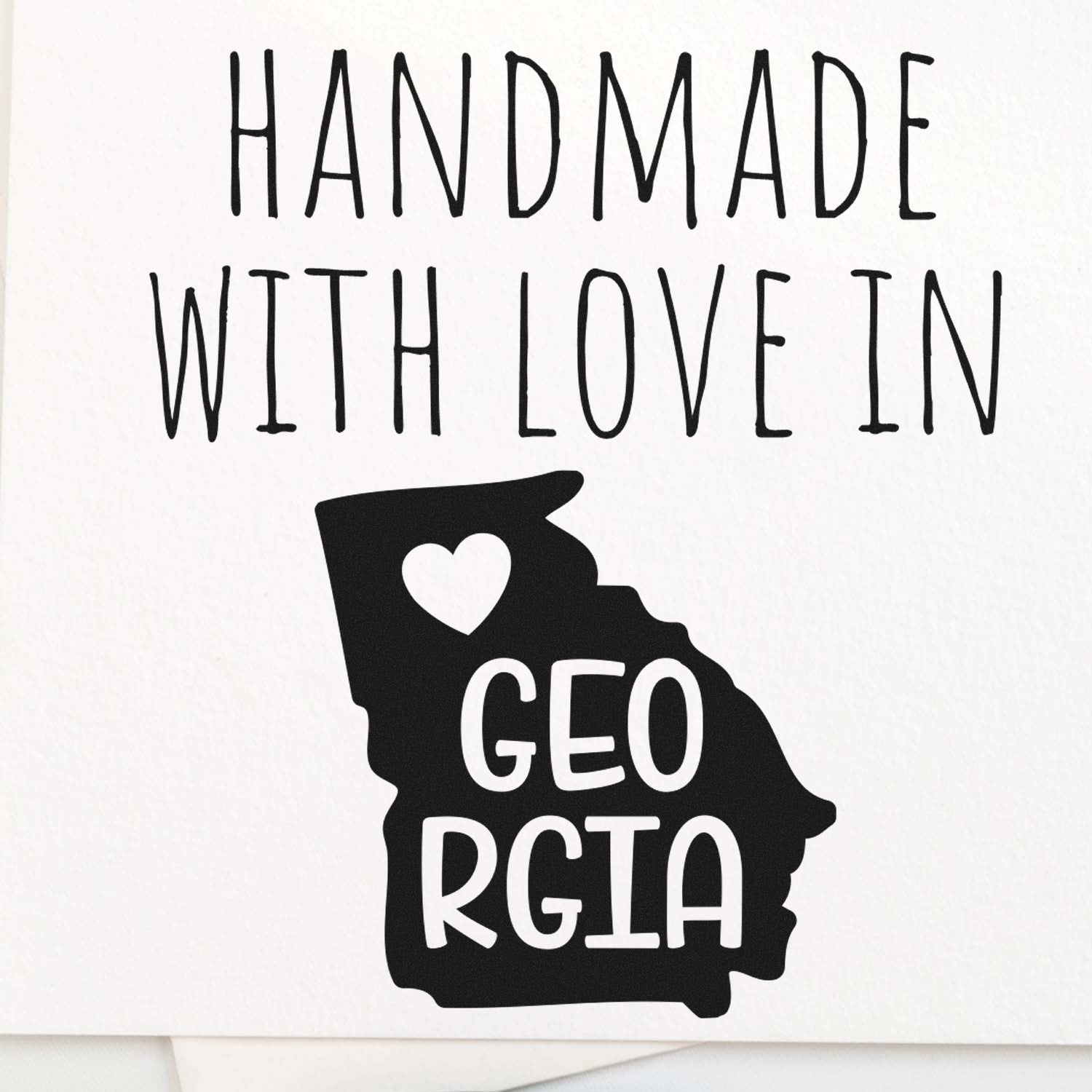 Wood Handle Georgia Handmade with Love Rubber Stamp featuring a heart and Georgia state outline, perfect for crafts and gifts.