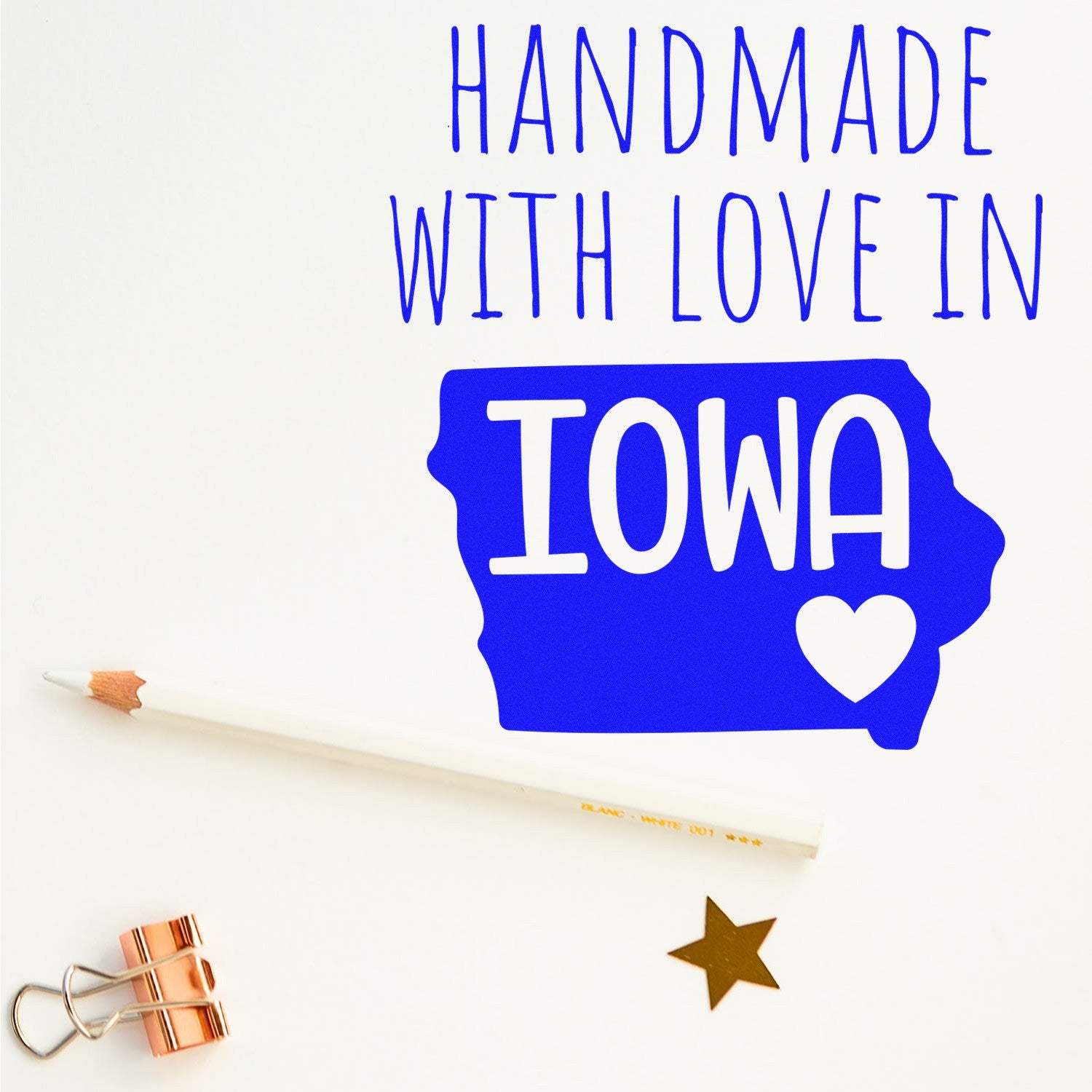 Self-Inking Iowa Handmade with Love Stamp featuring a blue Iowa state outline with Handmade with Love text, a heart, and a pencil nearby. Perfect for crafts and gifts.