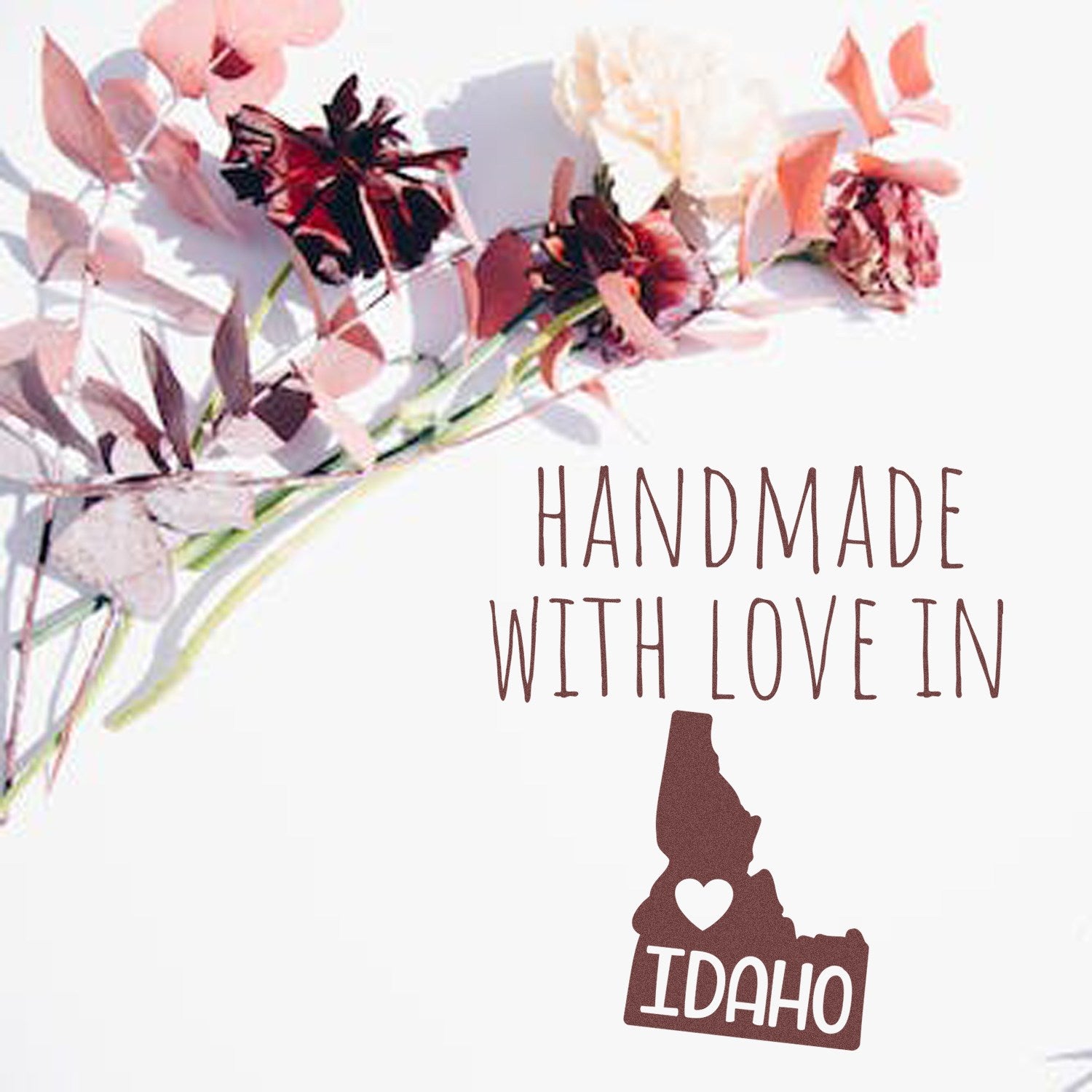 Handmade with Love in Idaho Slim Pre-Inked Stamp with floral design, featuring the state outline and heart, perfect for crafts and gifts.