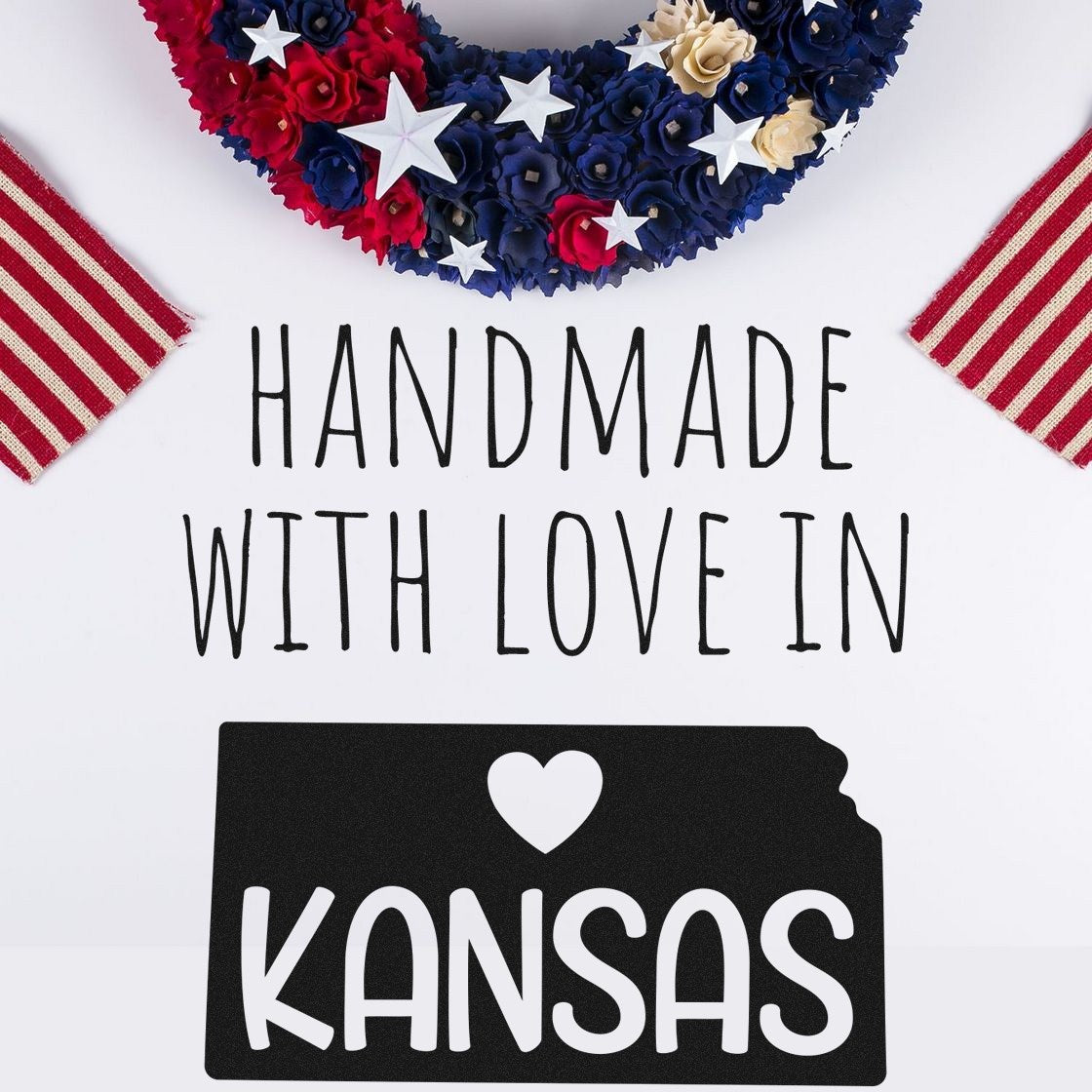 PSI Pre-Inked Handmade with Love in Kansas stamp, featuring a heart and Kansas outline, surrounded by patriotic decor with stars and stripes.