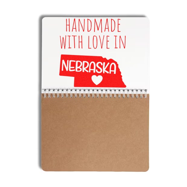 Wood Handle Nebraska Handmade with Love Rubber Stamp featuring a red Nebraska state outline and heart, perfect for crafts and gifts. Durable wood handle for easy stamping.