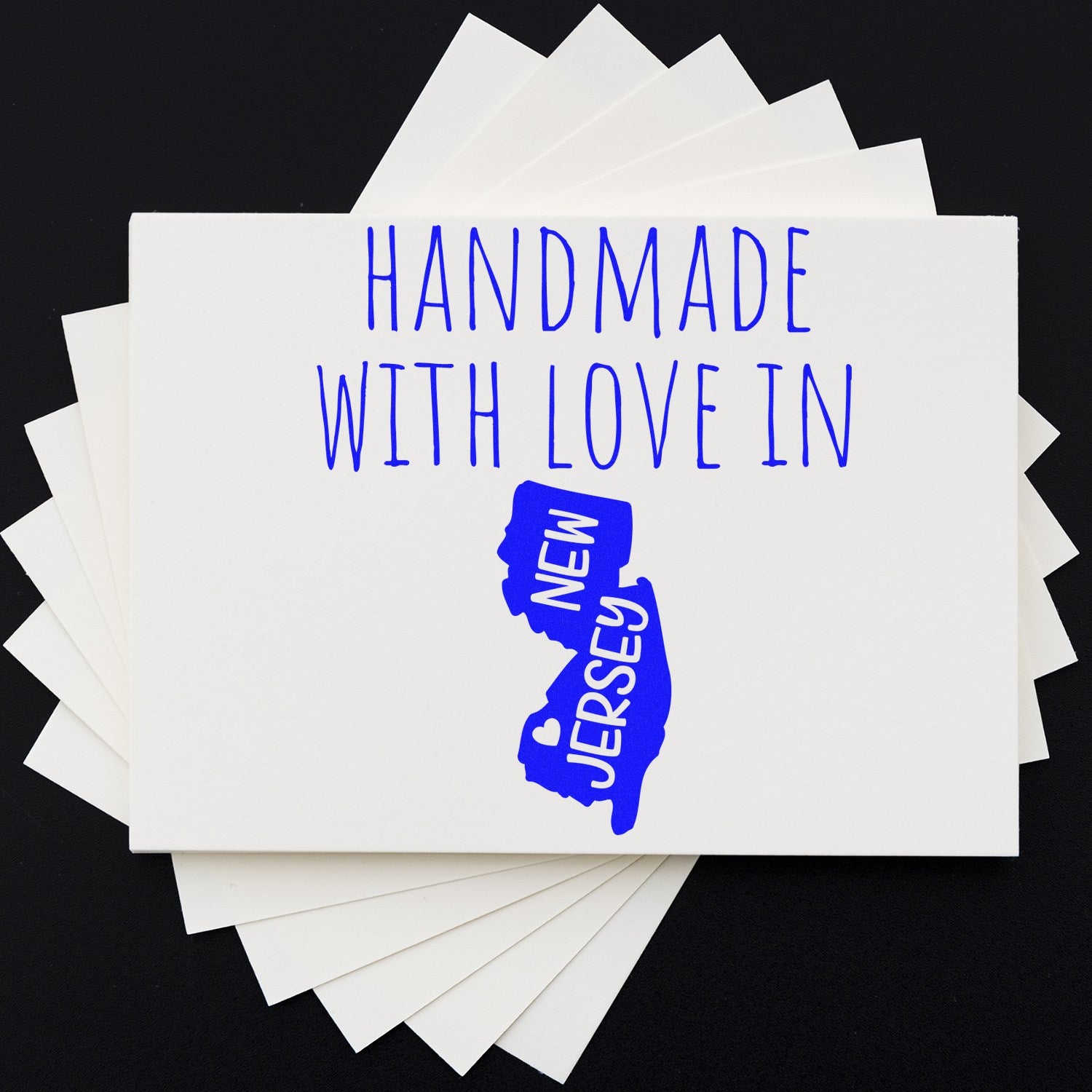 Self-Inking New Jersey Handmade with Love Stamp on white paper, featuring blue text and a New Jersey state outline with a heart. Perfect for crafts and personalized gifts.