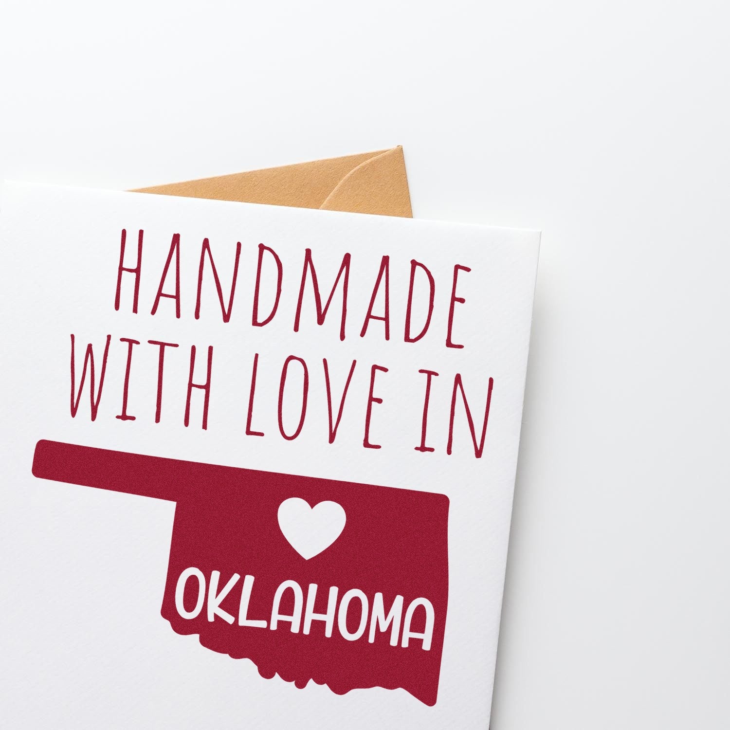 Handmade with Love in Oklahoma Slim Pre-Inked Stamp featuring a red Oklahoma state outline with a heart, perfect for adding a personal touch to cards and crafts.