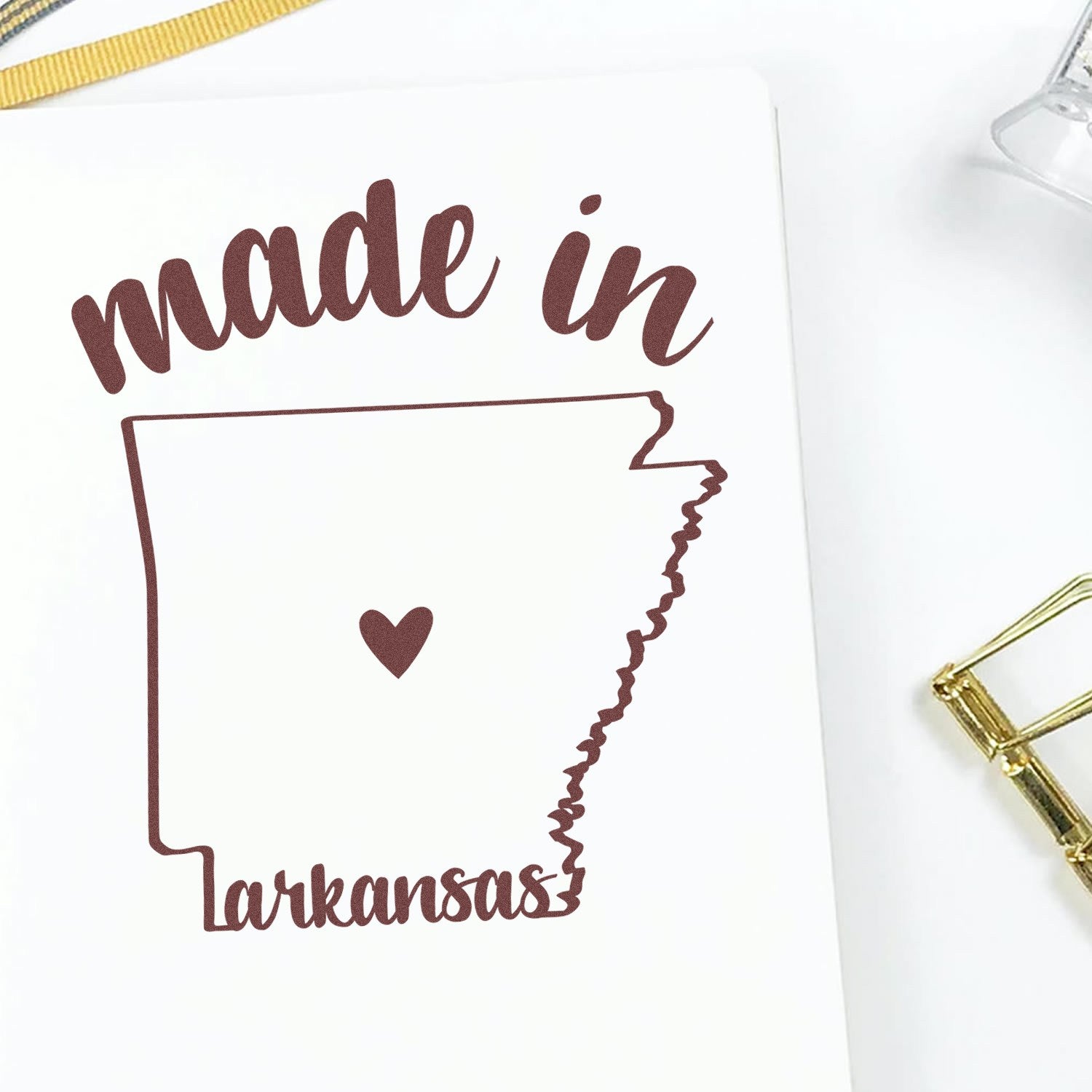 Made with Love in Arkansas Rubber Stamp featuring a heart inside the state outline, with 'made in Arkansas' text in stylish font. Perfect for crafts and gifts.