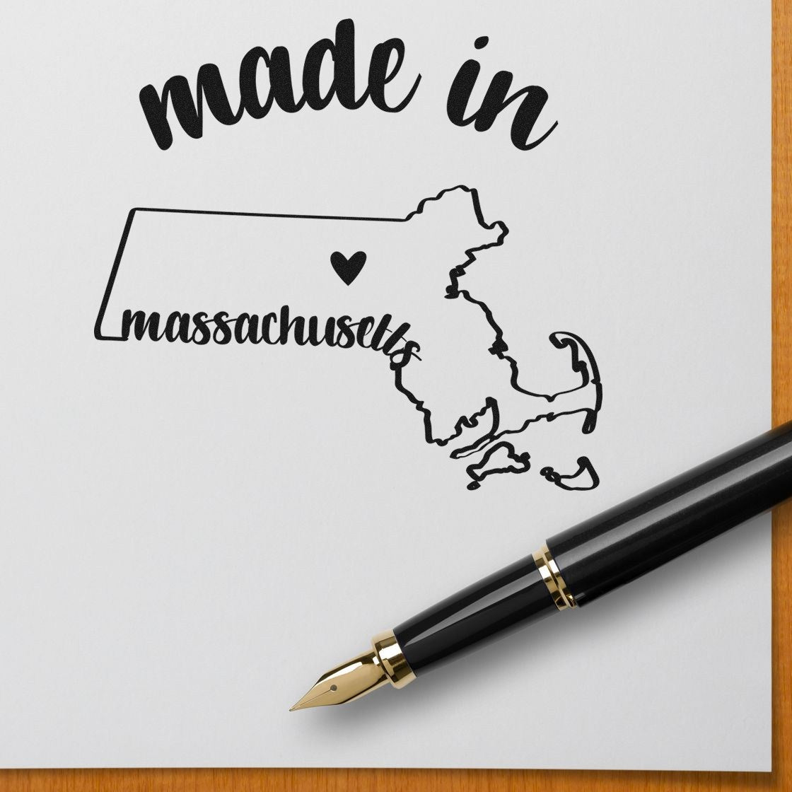 Slim Pre-Inked Stamp Massachusetts Made in Stamp, featuring a black ink design of Massachusetts with made in text, perfect for personalized stationery or crafts.