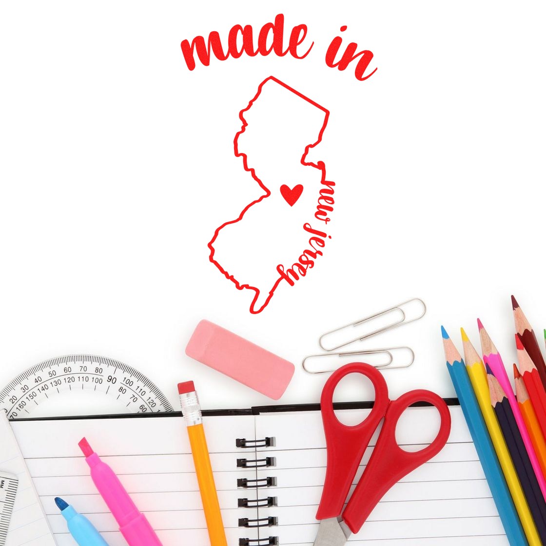 Self-Inking Handmade with Love in New Jersey Stamp featuring a red outline of New Jersey with a heart, surrounded by colorful stationery items like pencils, scissors, and a notebook.